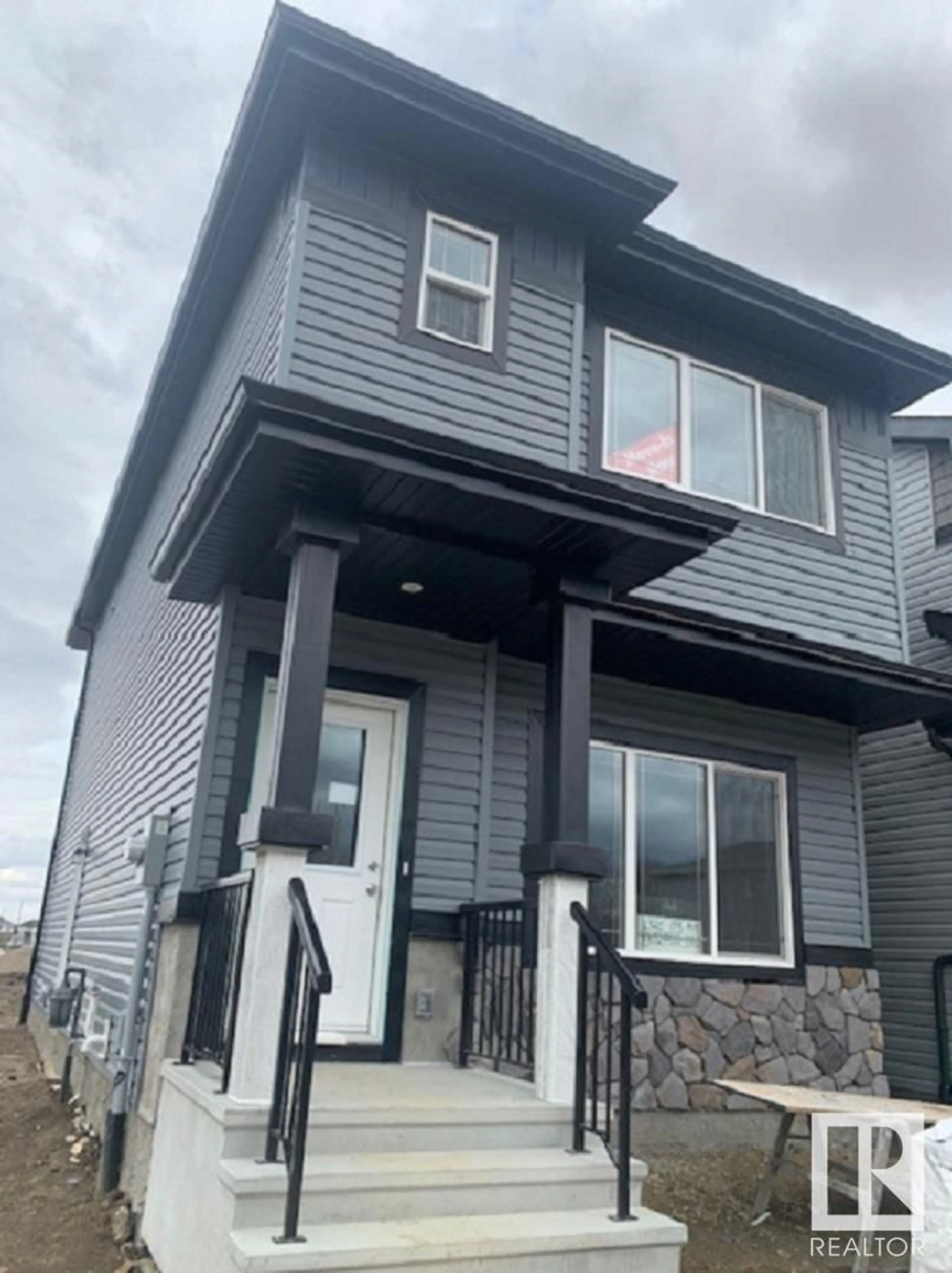 Frontside or backside of a home for 6320 175 AV NW, Edmonton Alberta T5Y4H2
