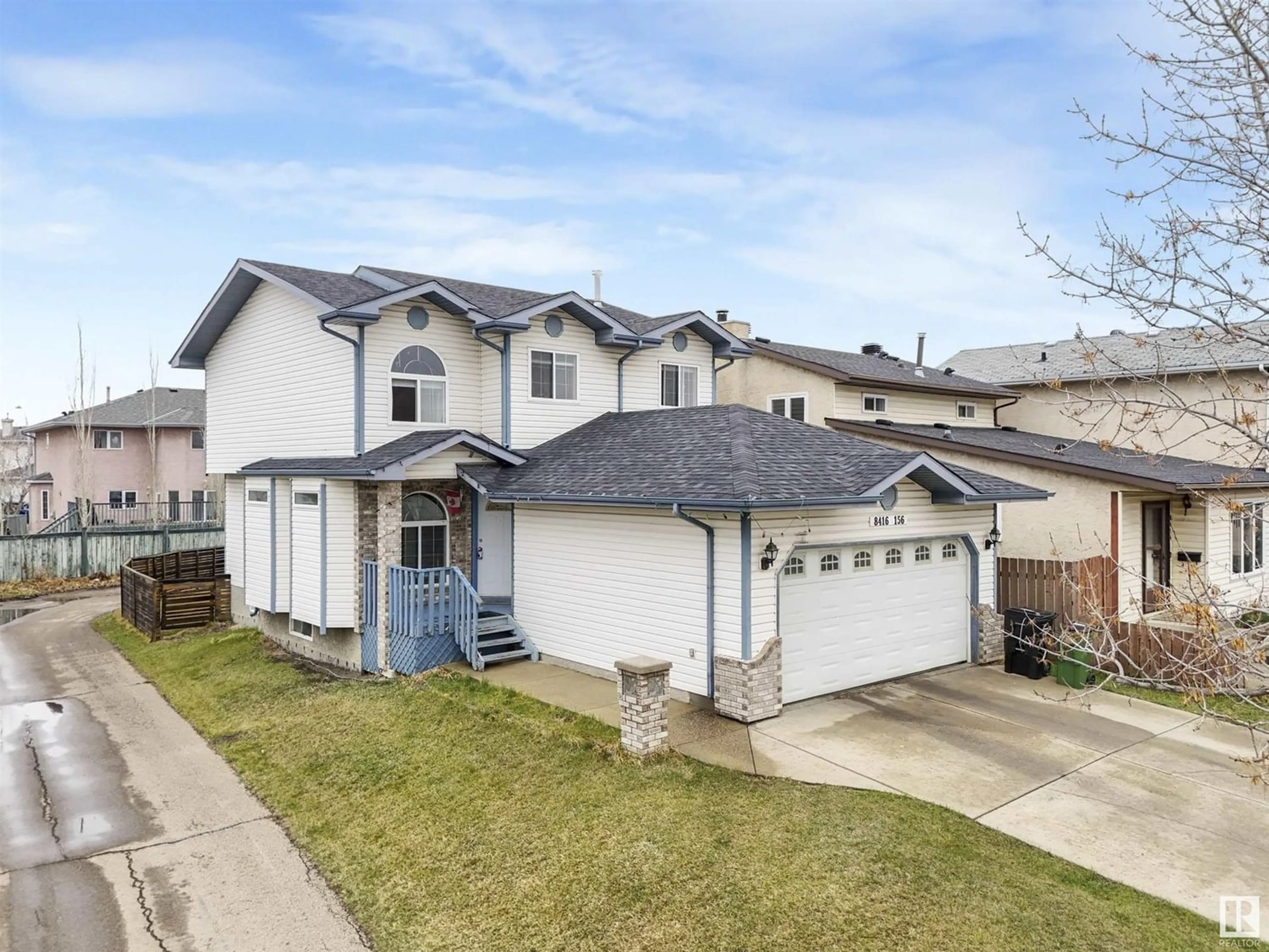 Frontside or backside of a home for 8416 156 AV NW, Edmonton Alberta T5Z3B4