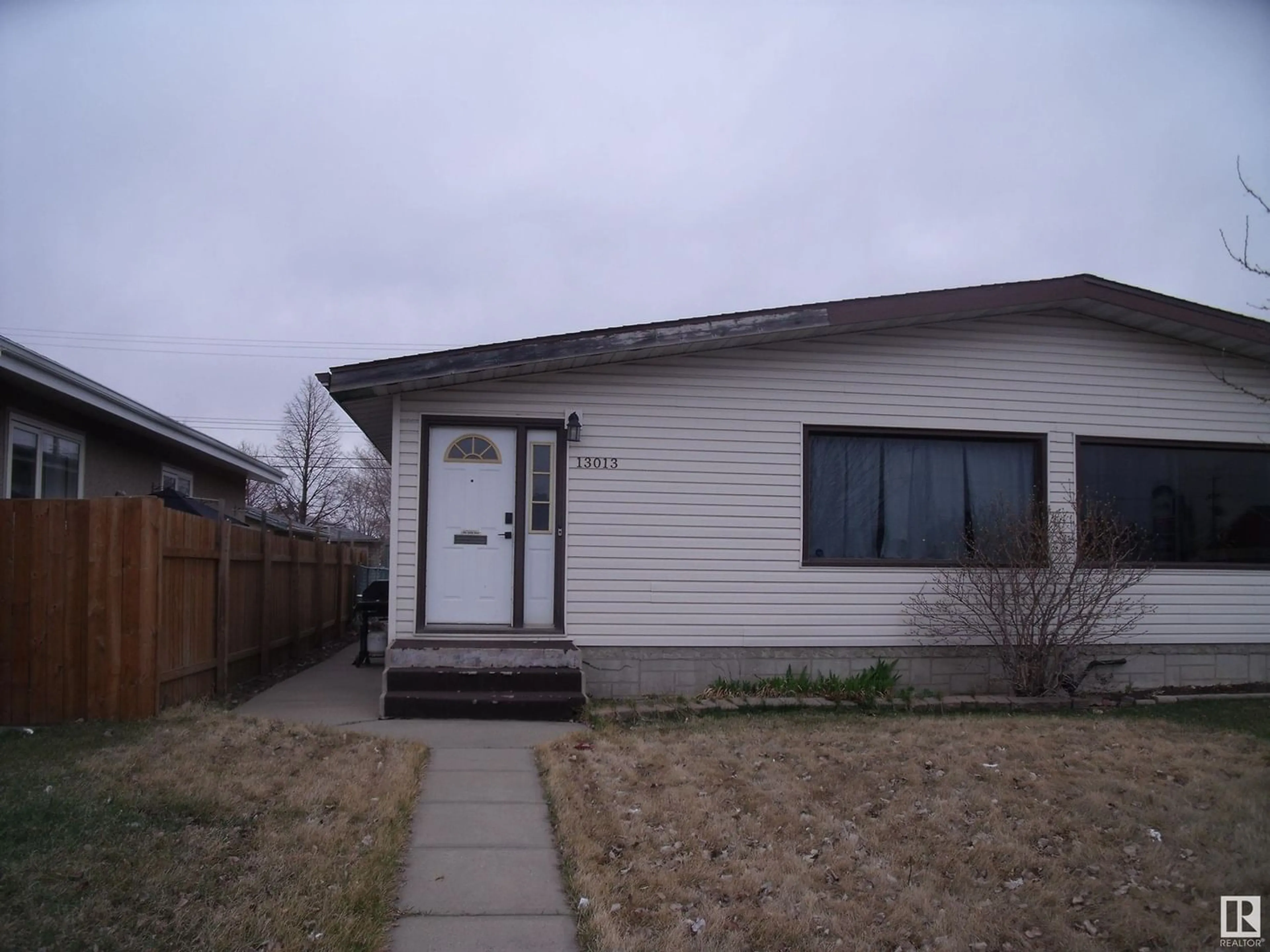 Frontside or backside of a home for 13013 82 ST NW, Edmonton Alberta T5E2T4