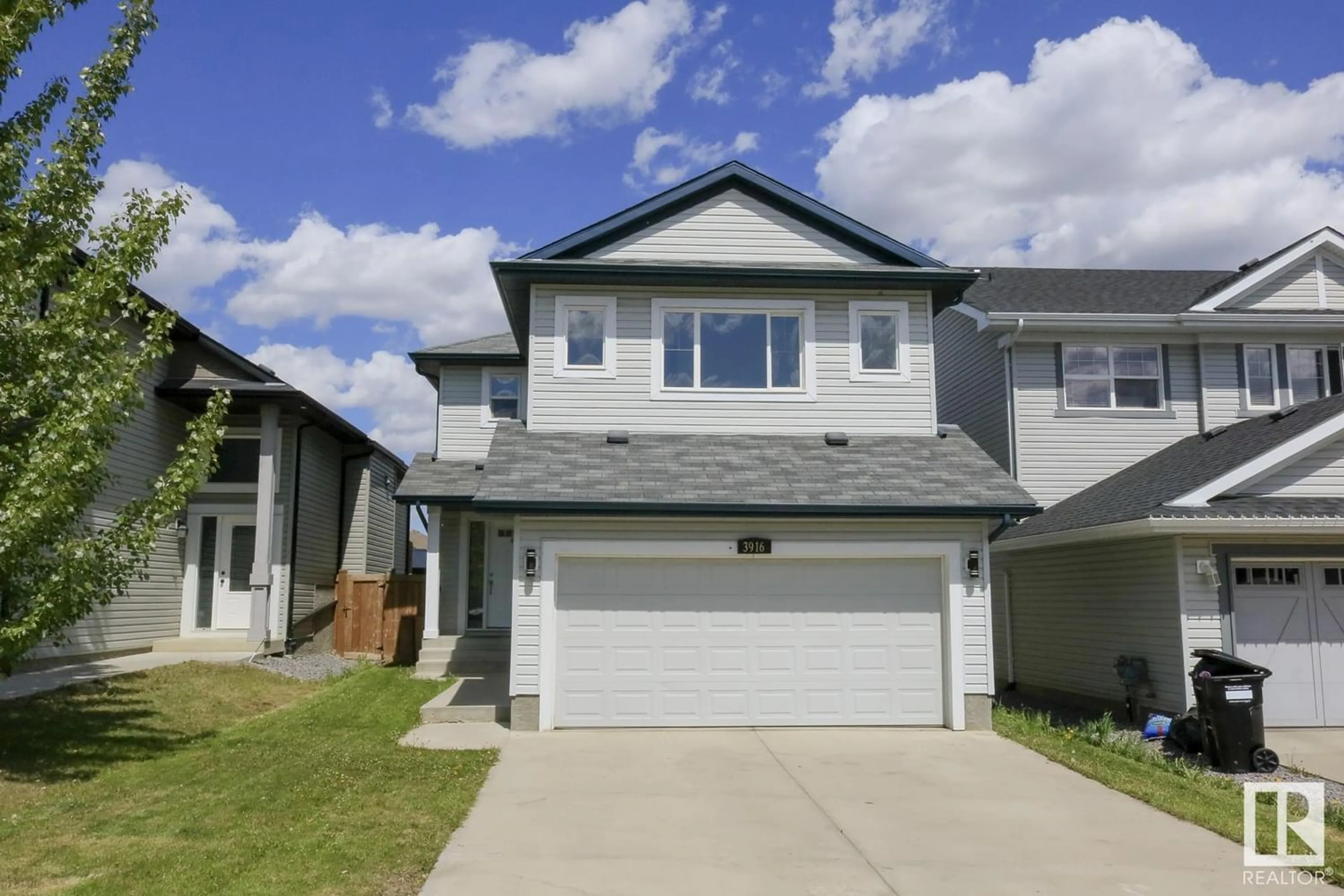 Frontside or backside of a home for 3916 166 AV NW, Edmonton Alberta T5Y0N9
