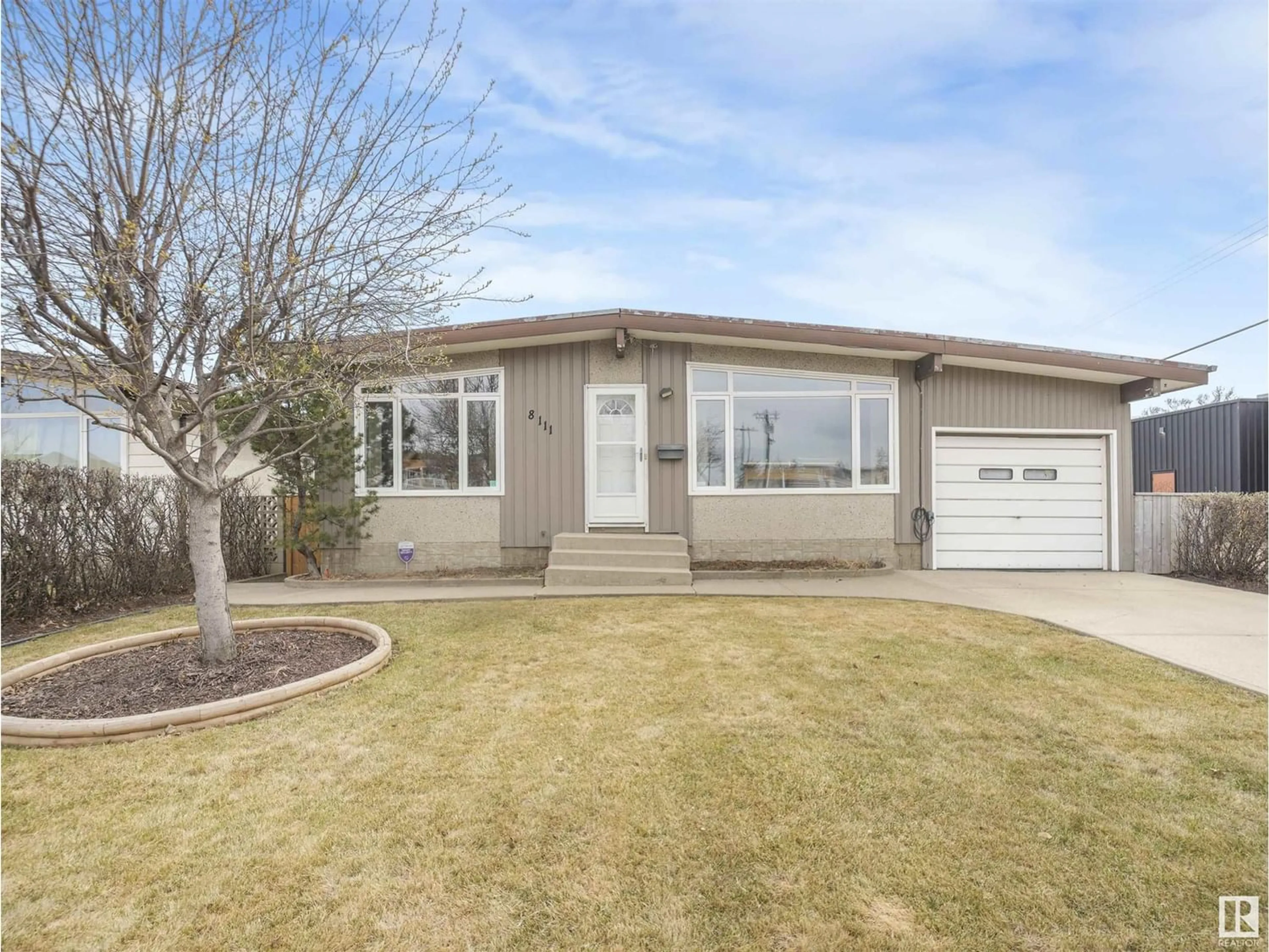 Frontside or backside of a home for 8111 132 AV NW, Edmonton Alberta T5C2B3