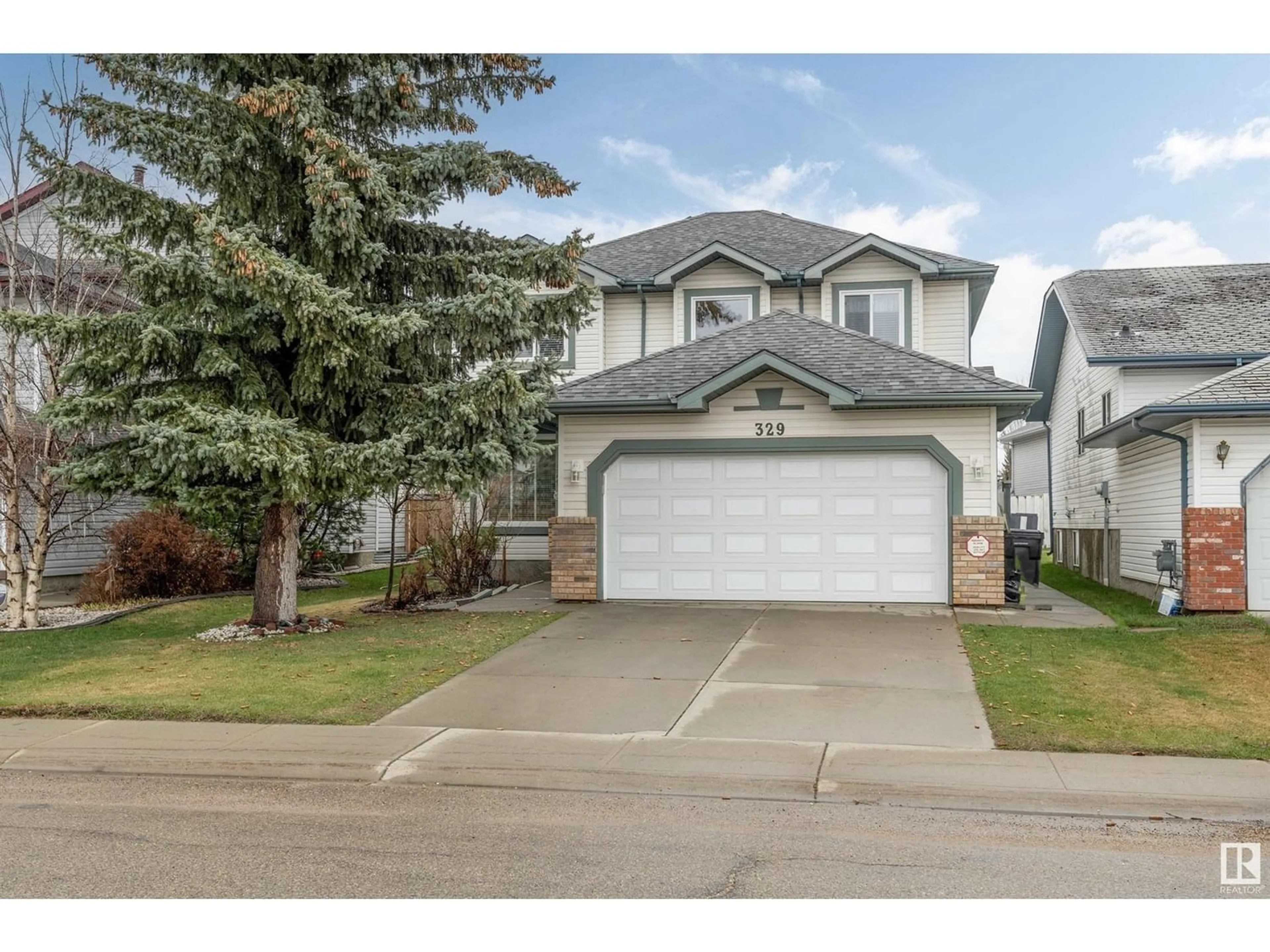 Frontside or backside of a home for 329 DECHENE WY NW, Edmonton Alberta T6M2M6