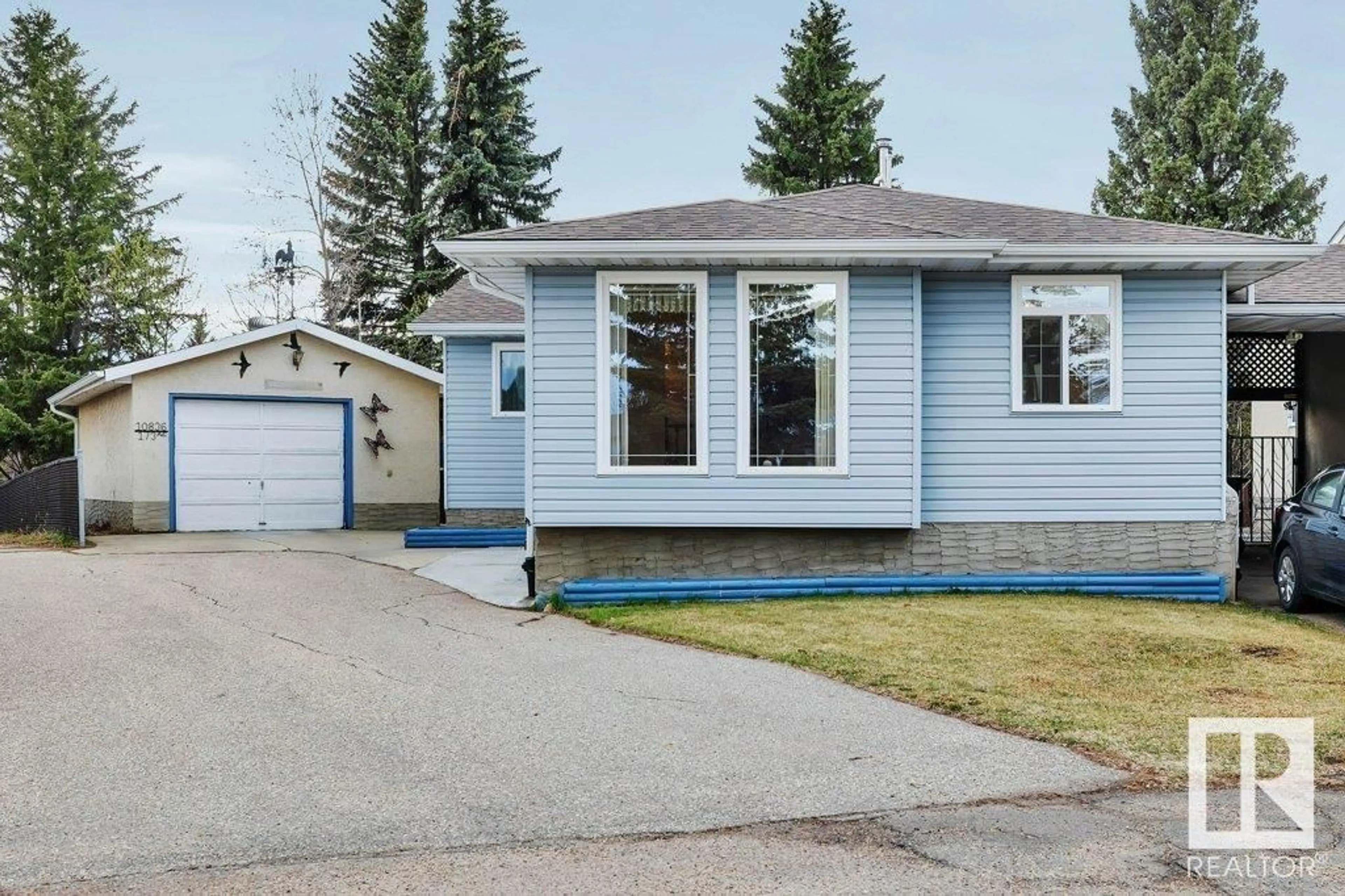 Home with vinyl exterior material for 10836 173 AV NW, Edmonton Alberta T5X3Z4