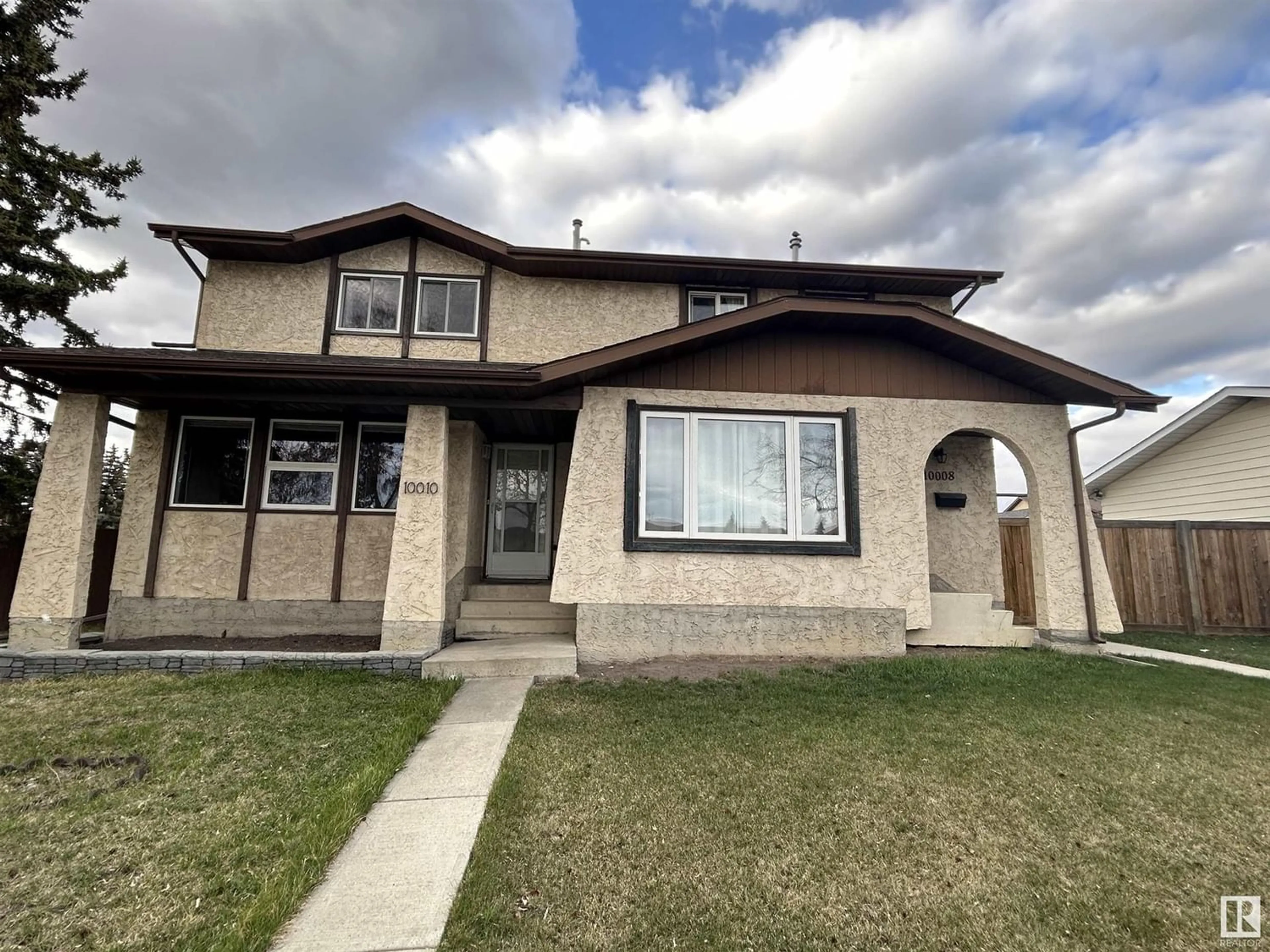 Frontside or backside of a home for 10010 172 AV NW, Edmonton Alberta T5X3X7