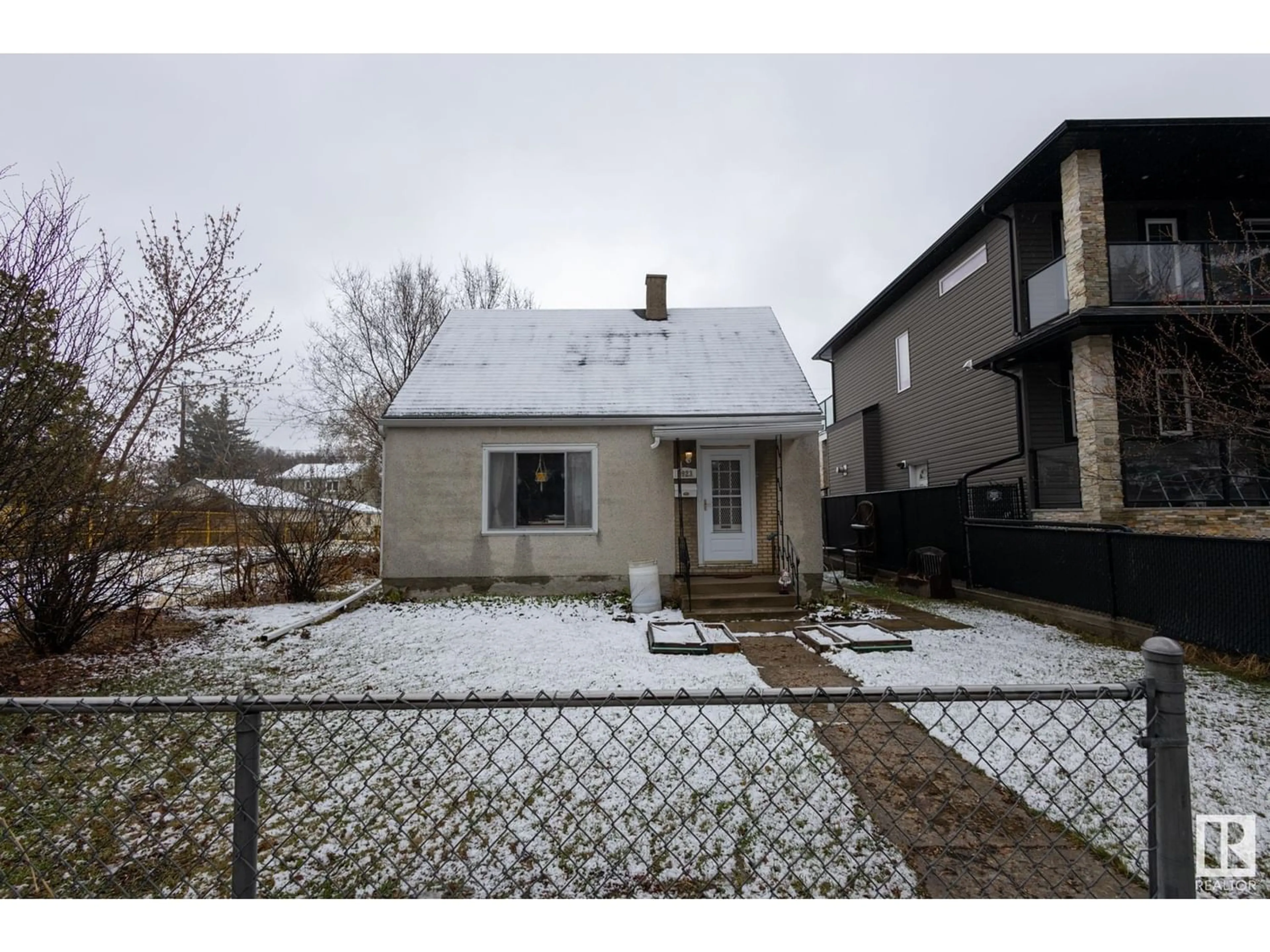 Frontside or backside of a home for 8923 81 AV NW, Edmonton Alberta T6C0W7