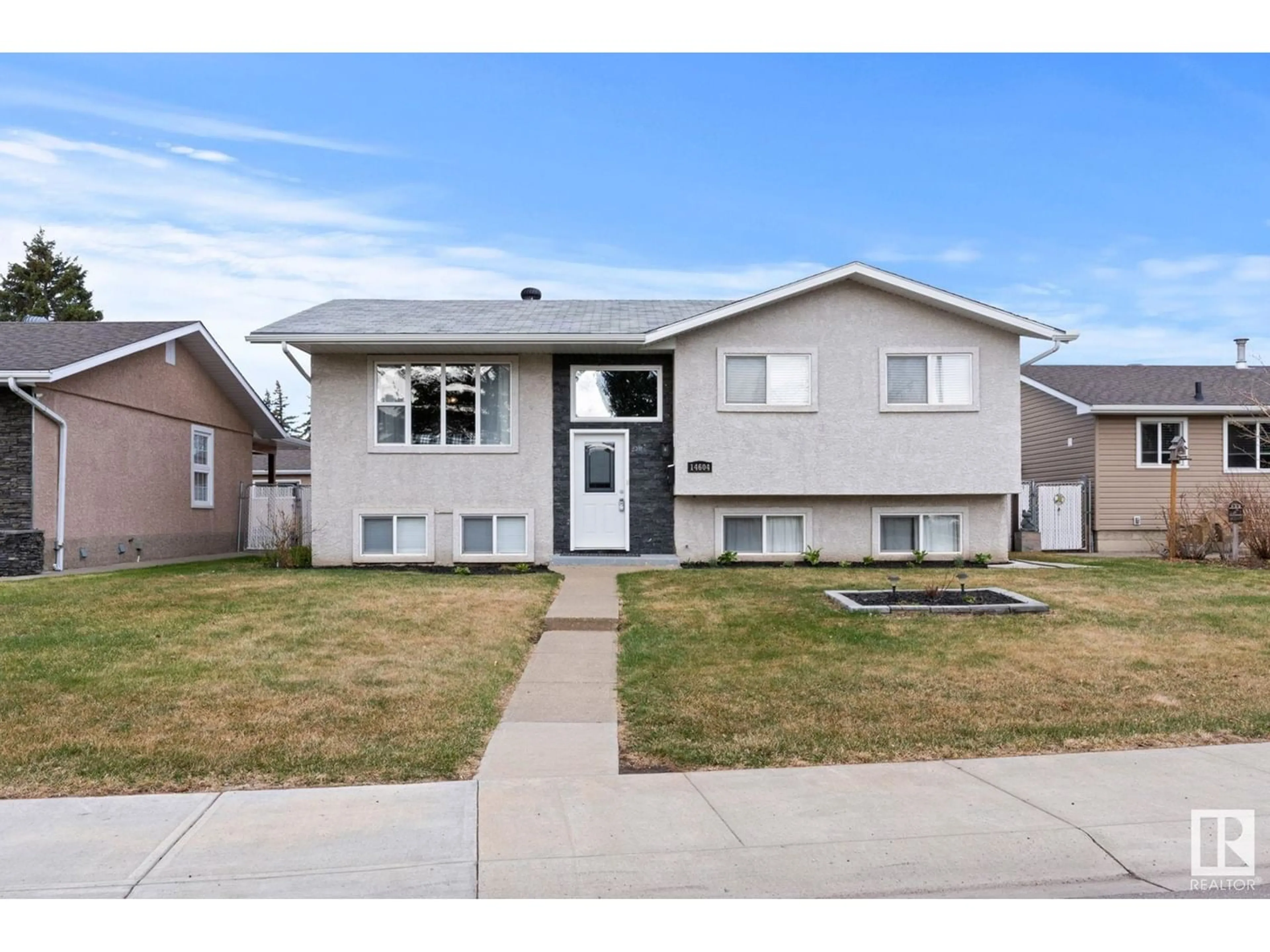 Frontside or backside of a home for 14604 80 ST NW, Edmonton Alberta T5C1L9