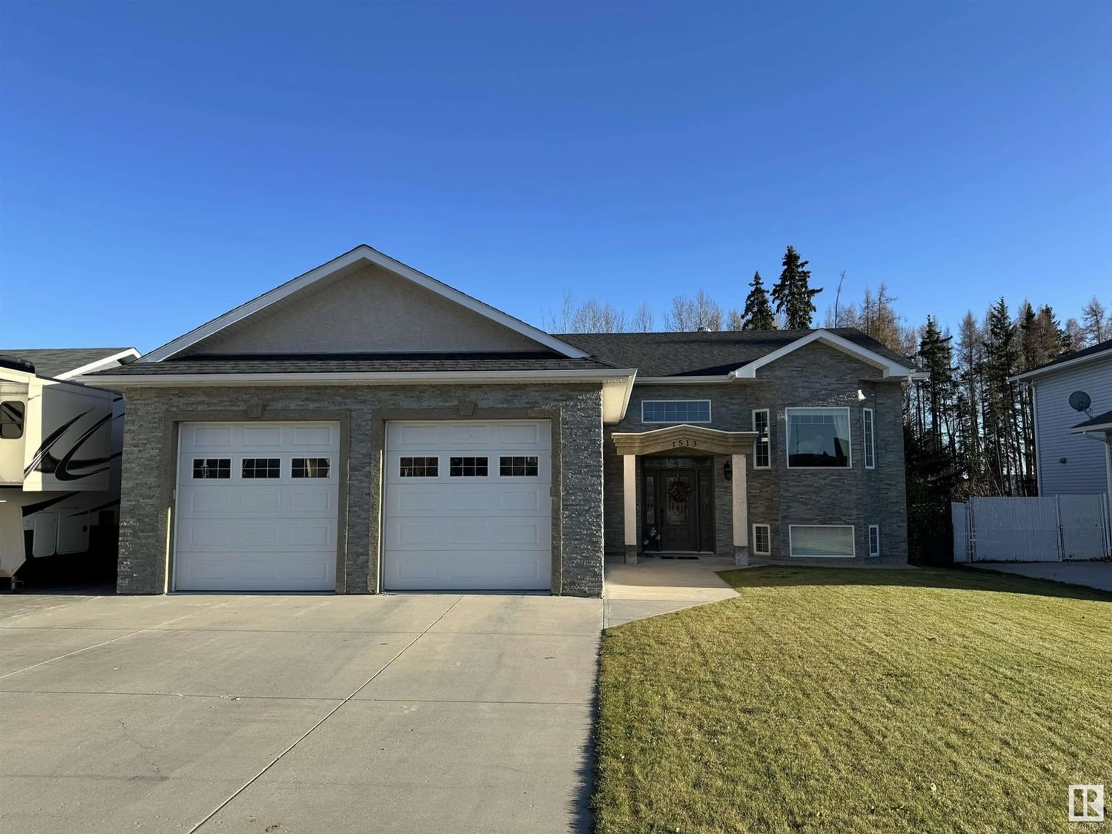 Frontside or backside of a home for 1513 Edson DR, Edson Alberta T7E1H6