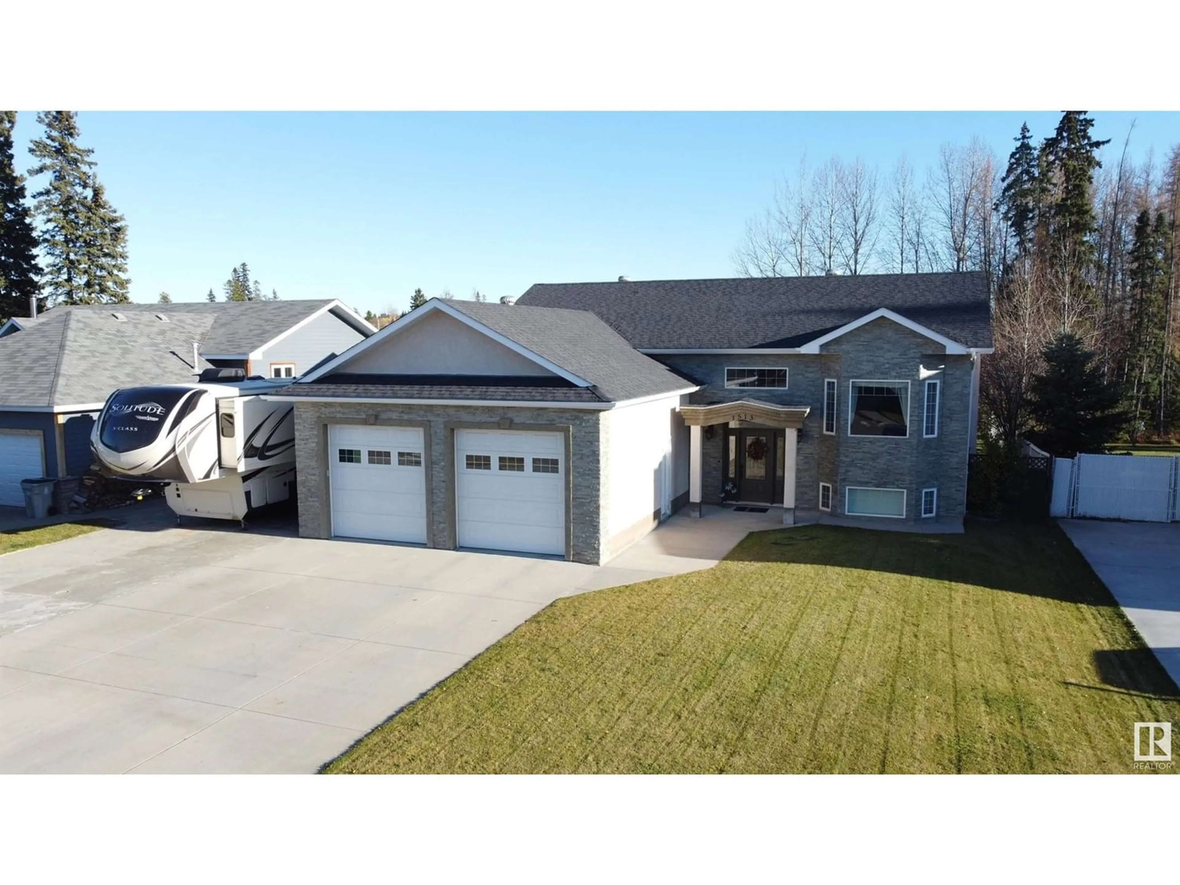 Frontside or backside of a home for 1513 Edson DR, Edson Alberta T7E1H6