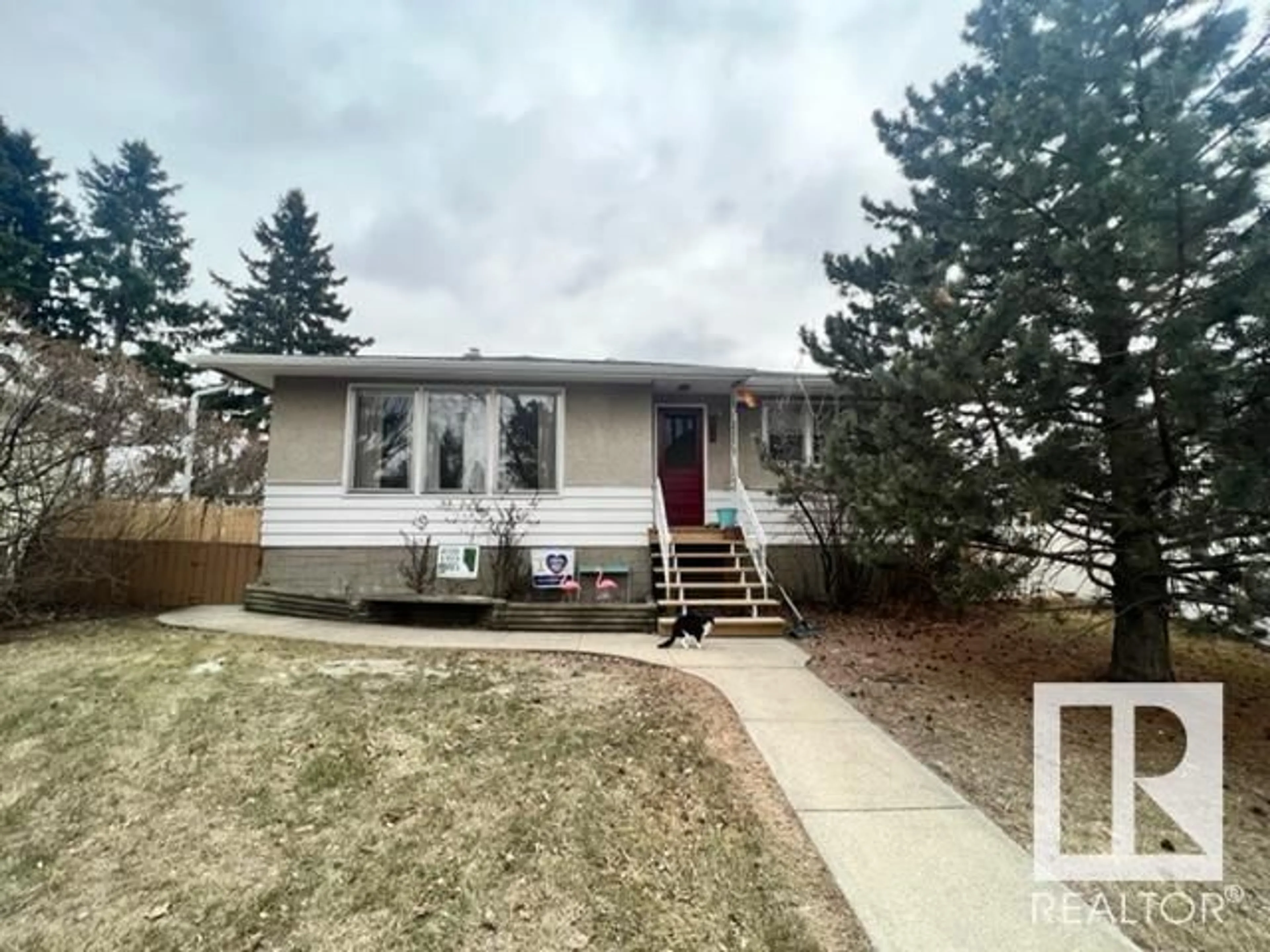Frontside or backside of a home for 8773 90 AV NW, Edmonton Alberta T6C1P3