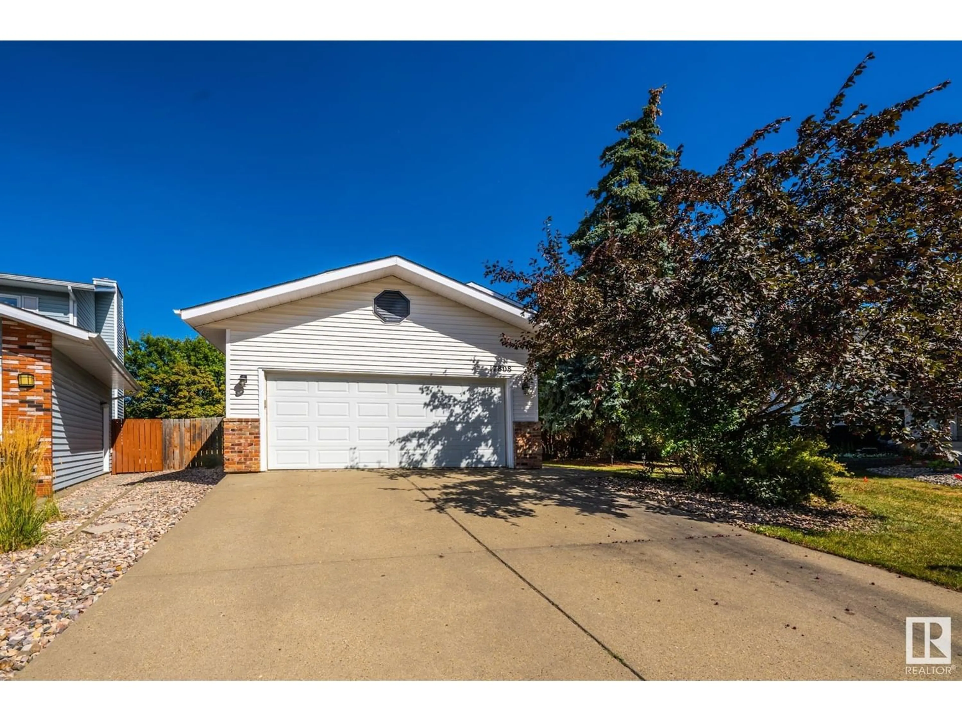 Frontside or backside of a home for 17808 58 AV NW, Edmonton Alberta T6M1S6