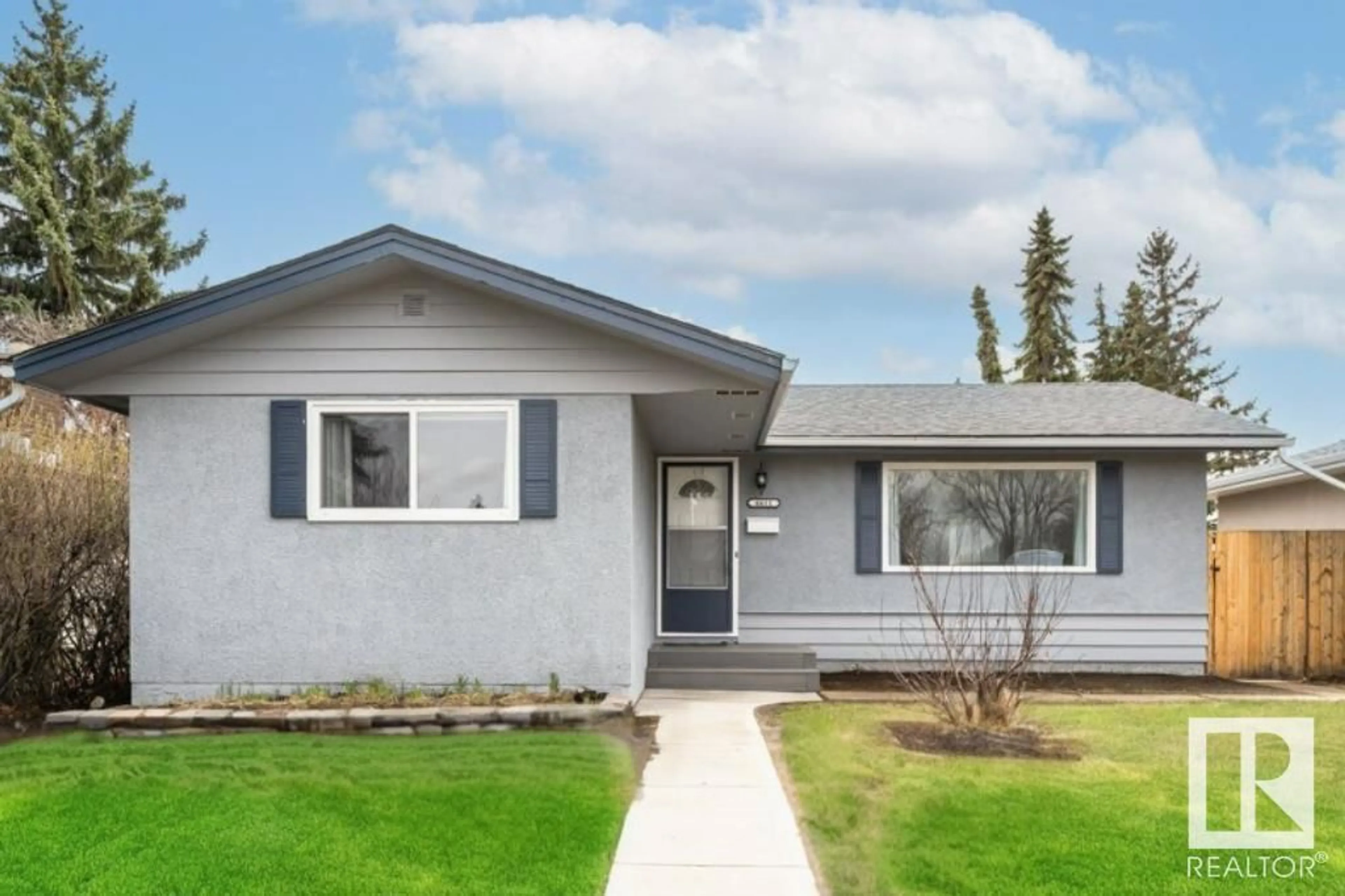 Home with vinyl exterior material for 6611 132A AV NW, Edmonton Alberta T5C2B5