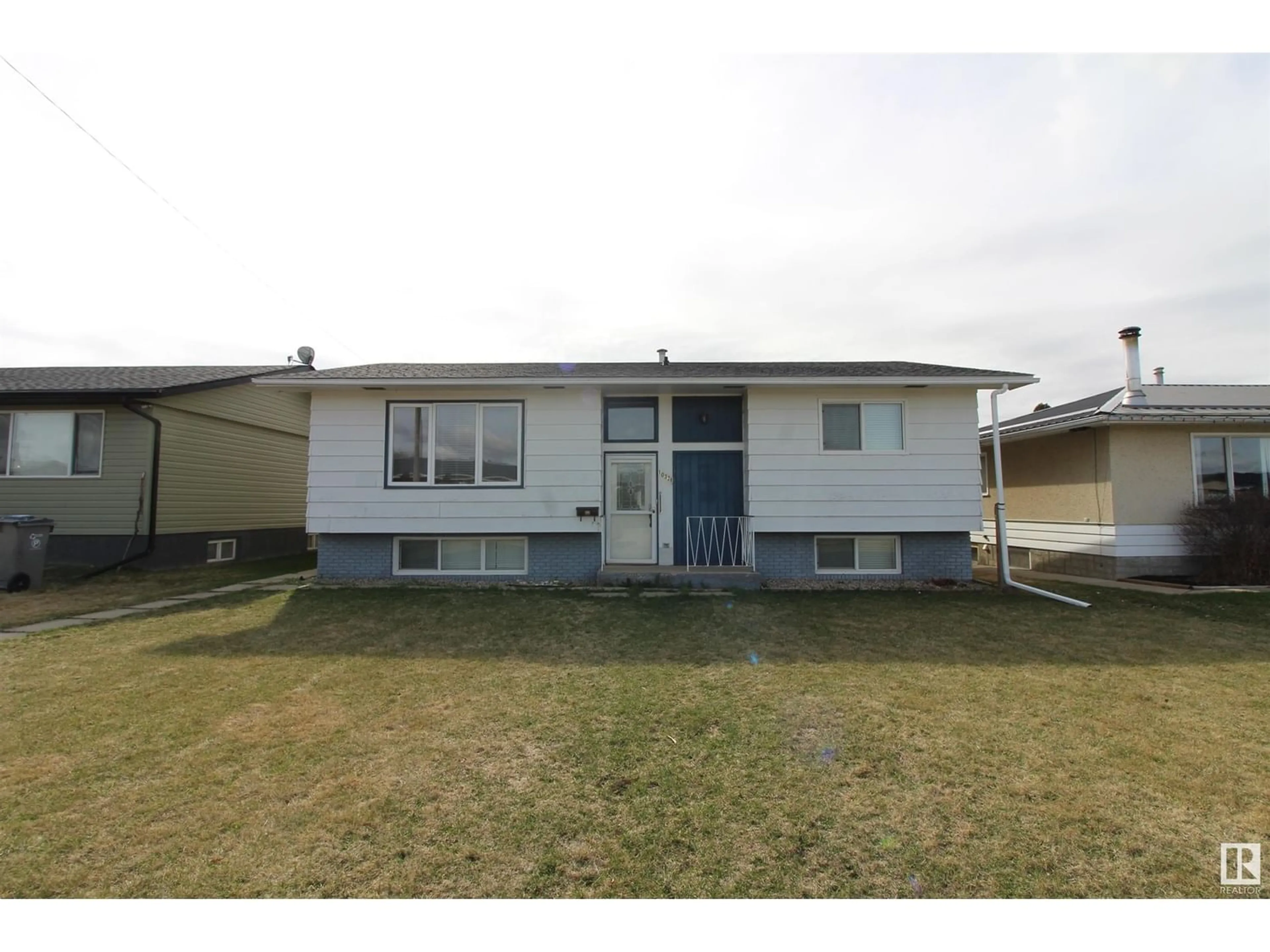 Frontside or backside of a home for 10328 108 AV, Westlock Alberta T7P1J3