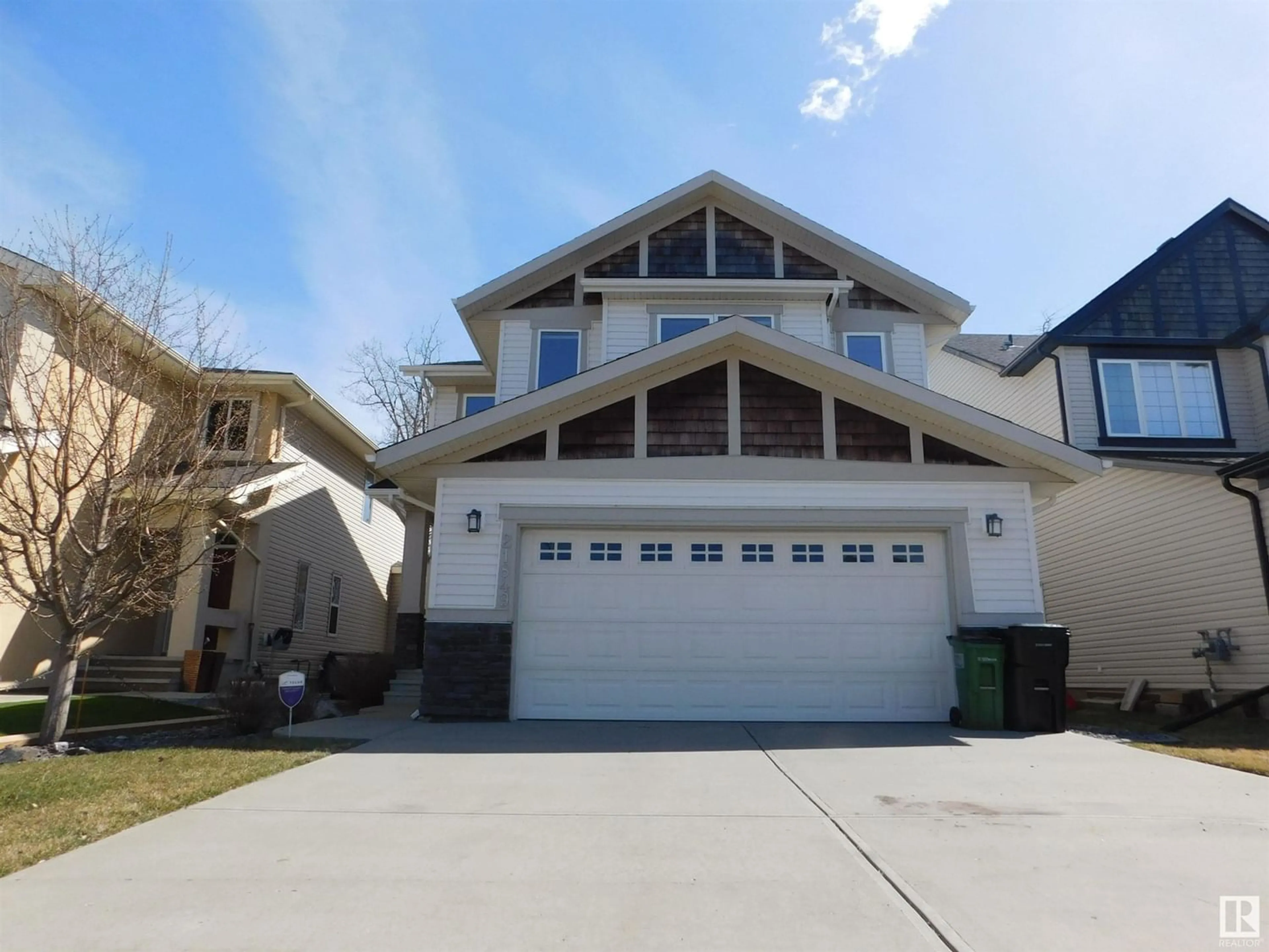 Frontside or backside of a home for 21849 95A AV NW NW, Edmonton Alberta T5T3Y6