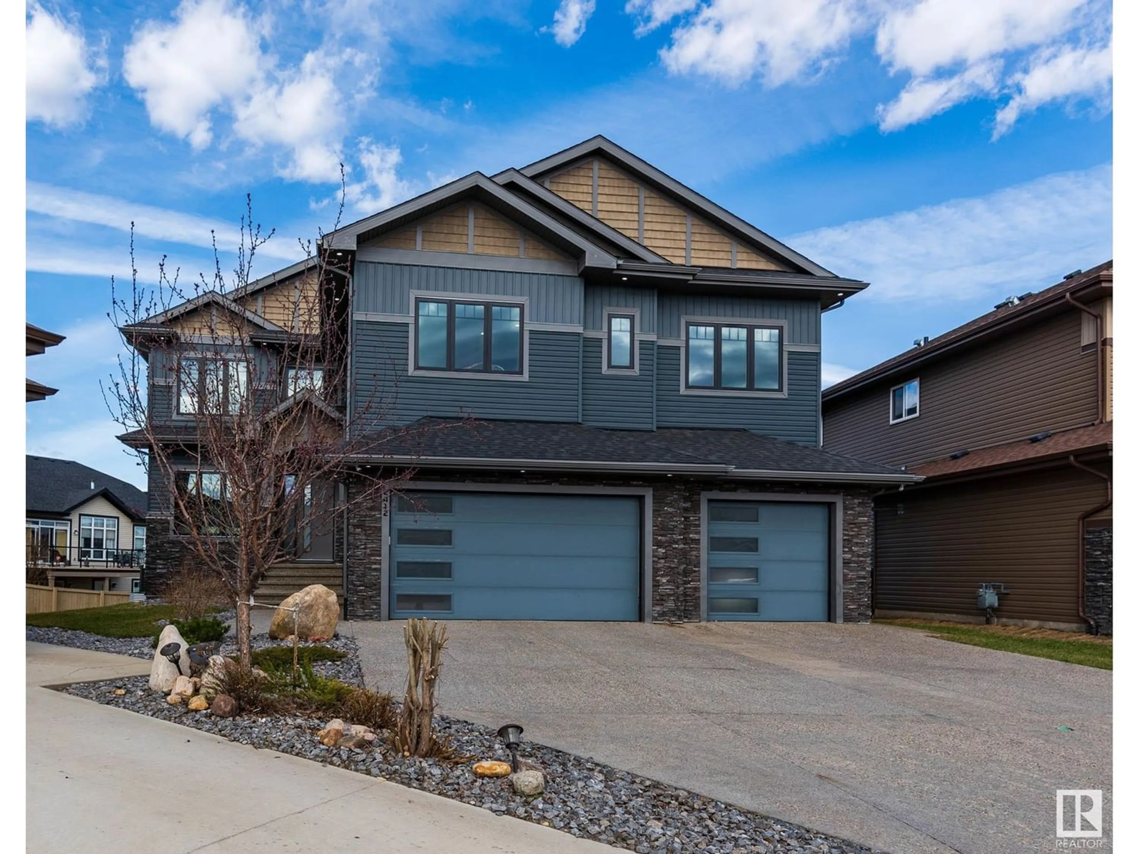 Frontside or backside of a home for 2412 ASHCRAFT CR SW, Edmonton Alberta T6W2M9