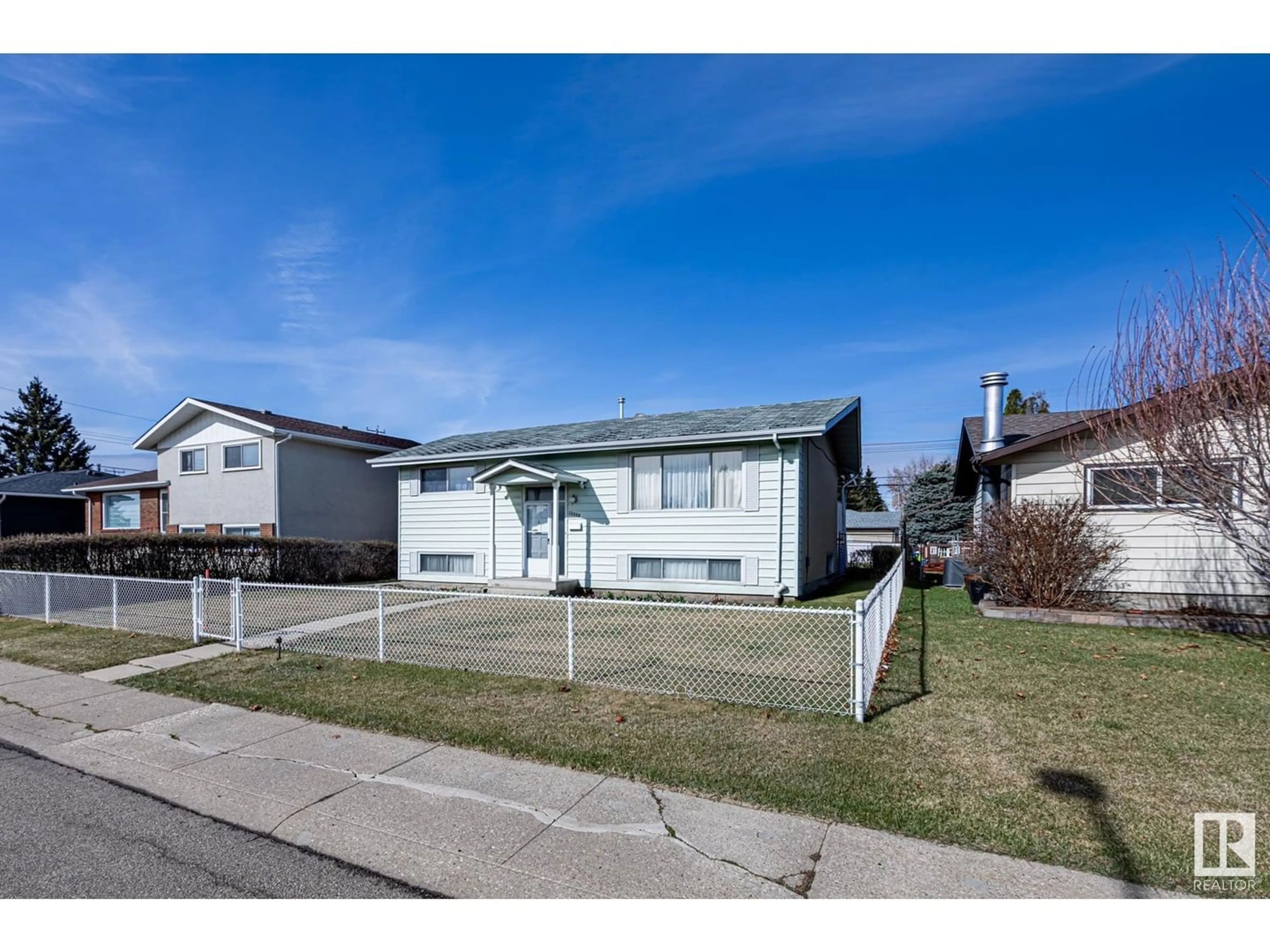 Frontside or backside of a home for 13320 72 ST NW, Edmonton Alberta T5C0R2