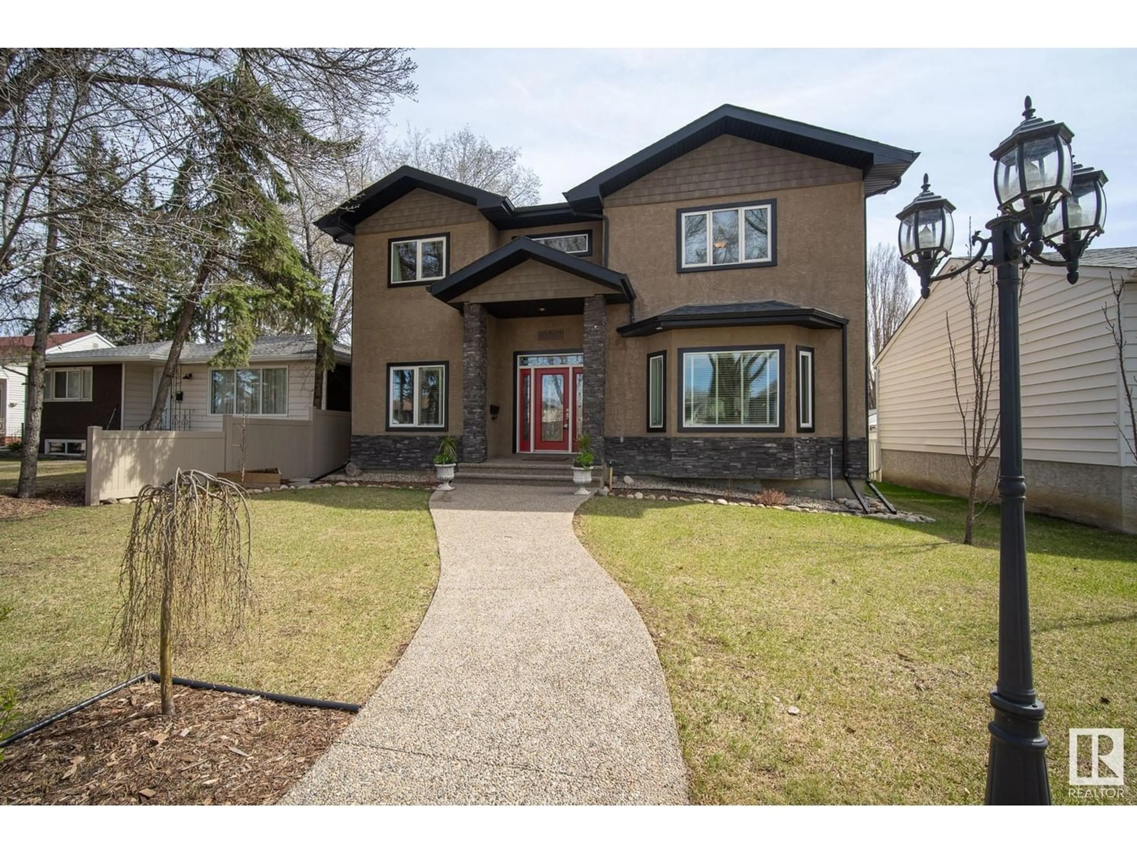 Frontside or backside of a home for 10307 74 ST NW, Edmonton Alberta T6A2Y4