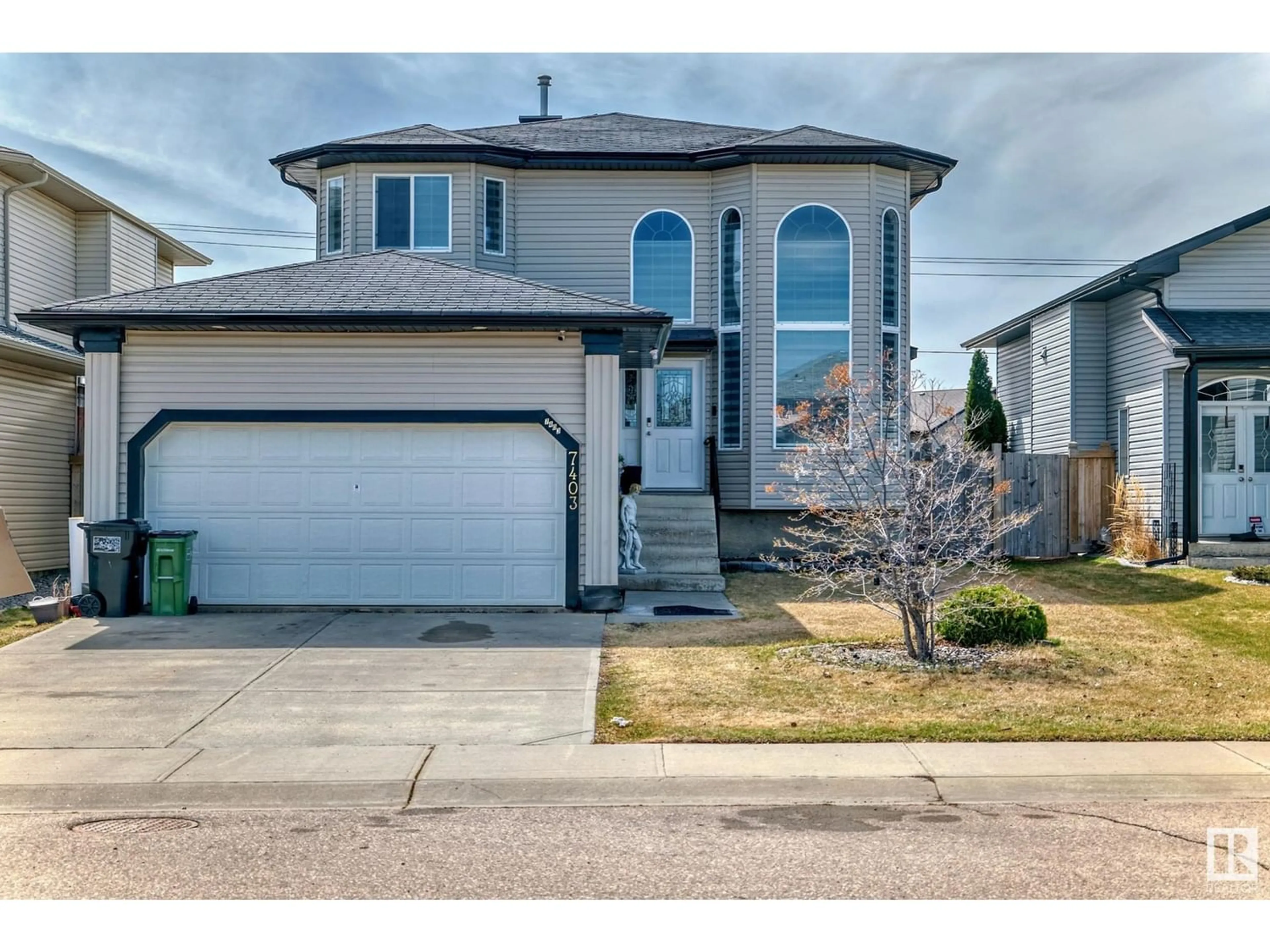 Frontside or backside of a home for 7403 168 AV NW, Edmonton Alberta T5Z0A3