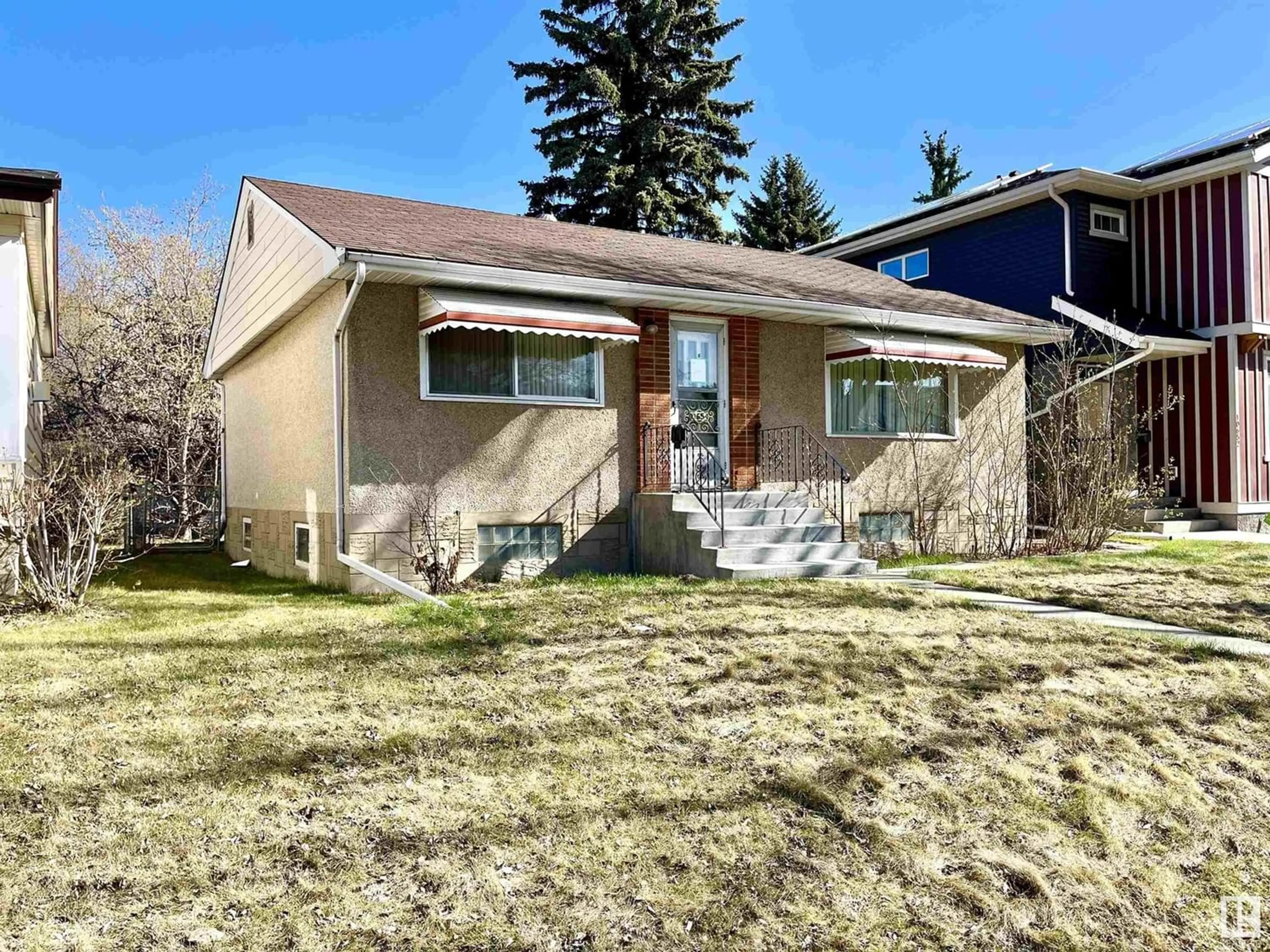 Frontside or backside of a home for 10654 64 AV NW, Edmonton Alberta T6H1S9