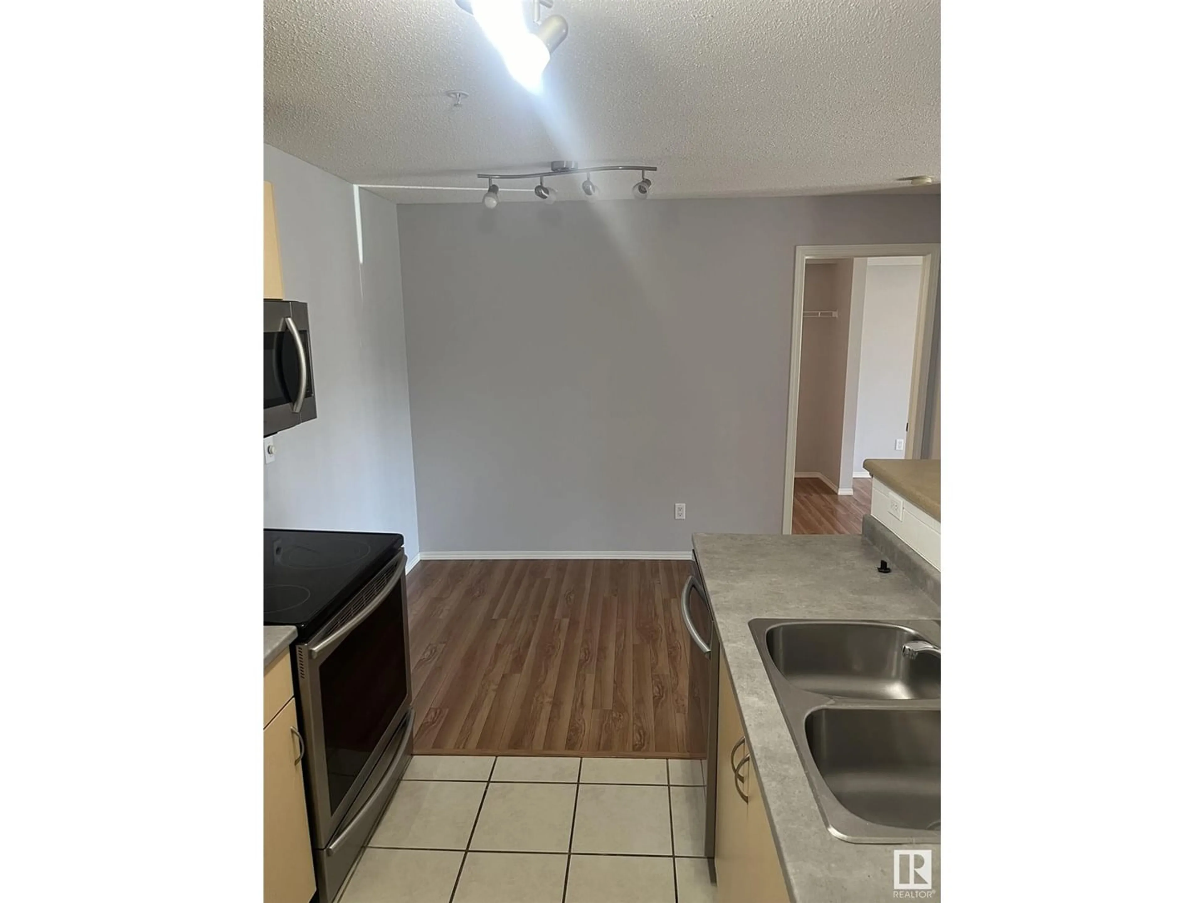 Kitchen for #202 17011 67 AV NW, Edmonton Alberta T5T6Y6