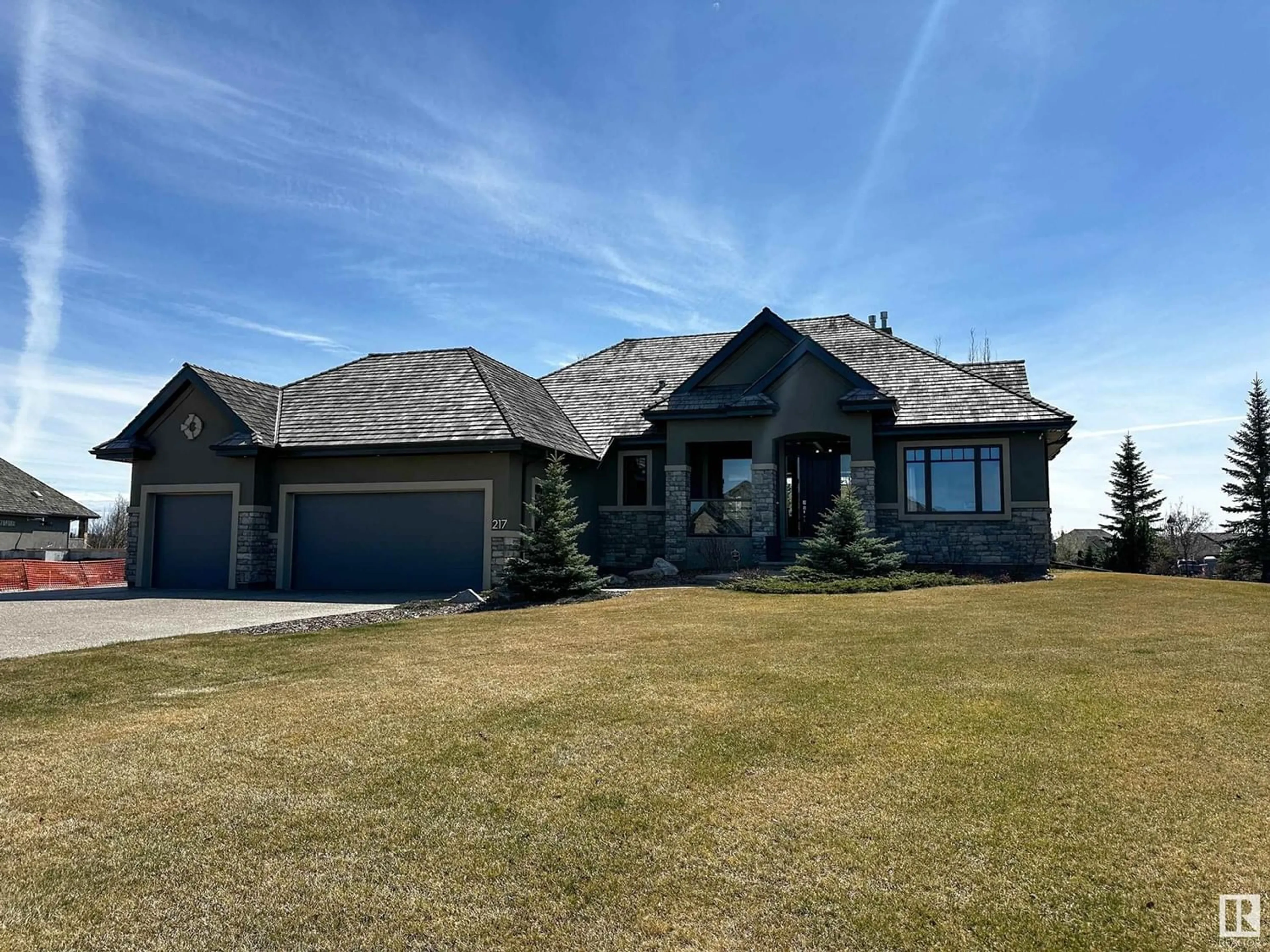 Frontside or backside of a home for 217 River Heights CV, Rural Sturgeon County Alberta T8T0B9
