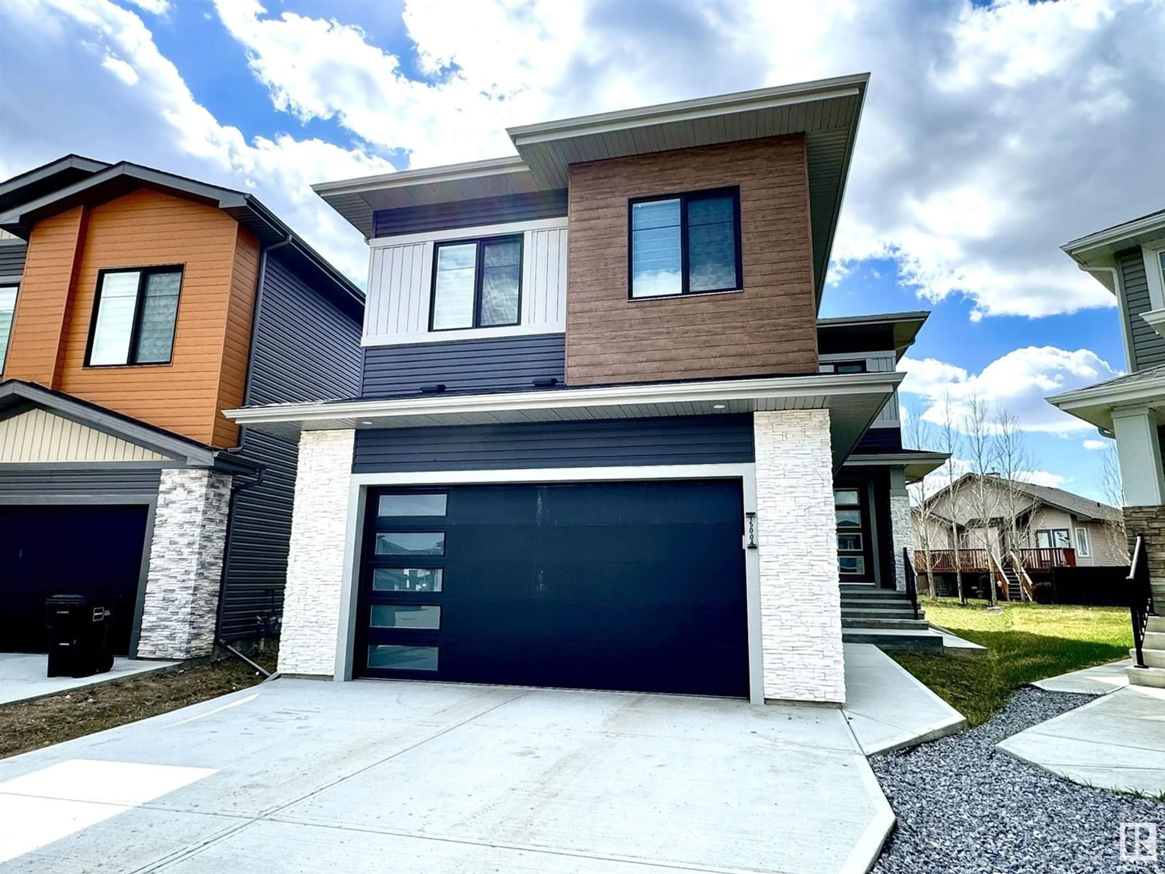 Frontside or backside of a home for 15004 15 ST NW, Edmonton Alberta T5Y3T4