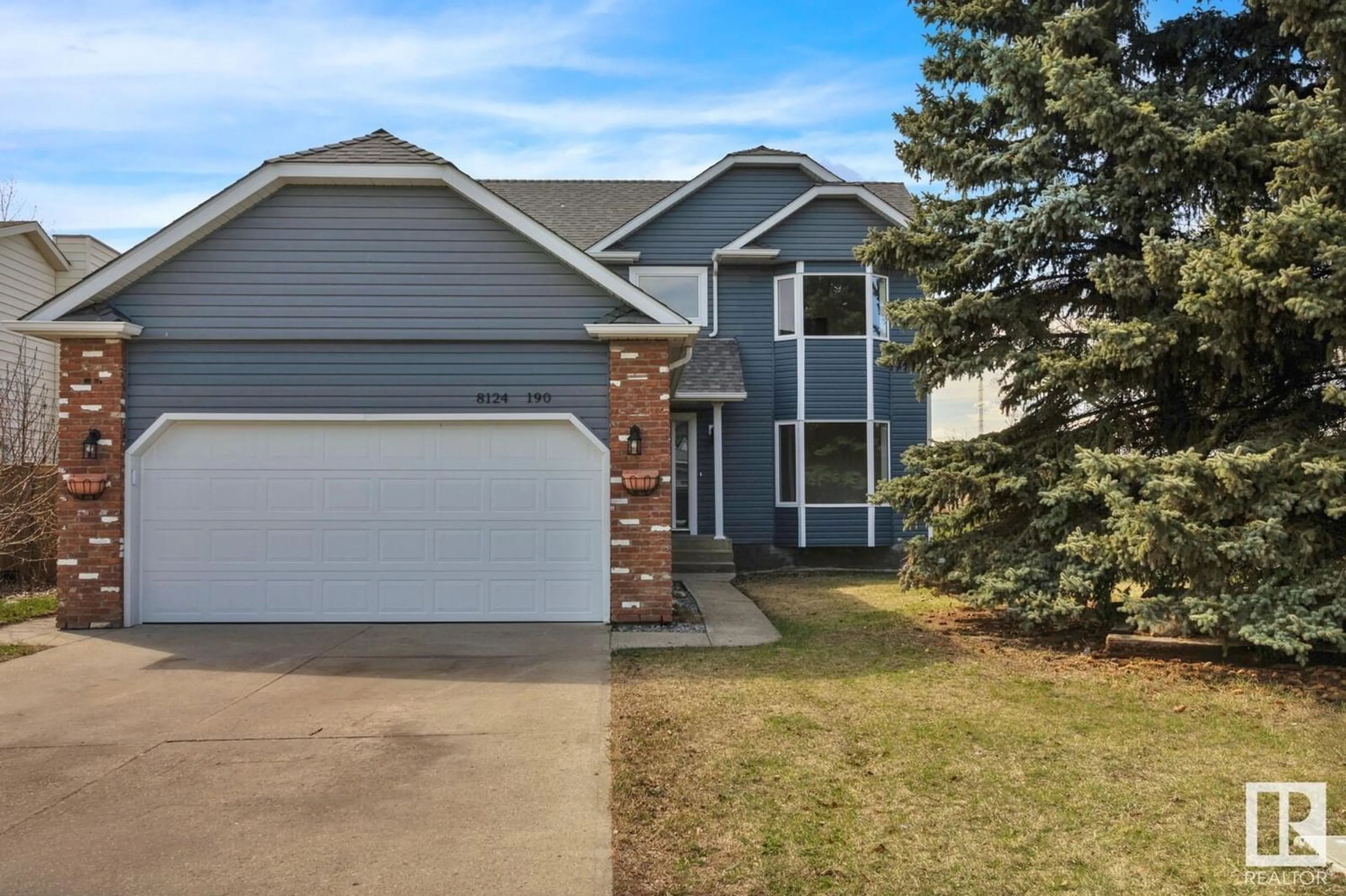 Frontside or backside of a home for 8124 190 ST NW, Edmonton Alberta T5T5C7