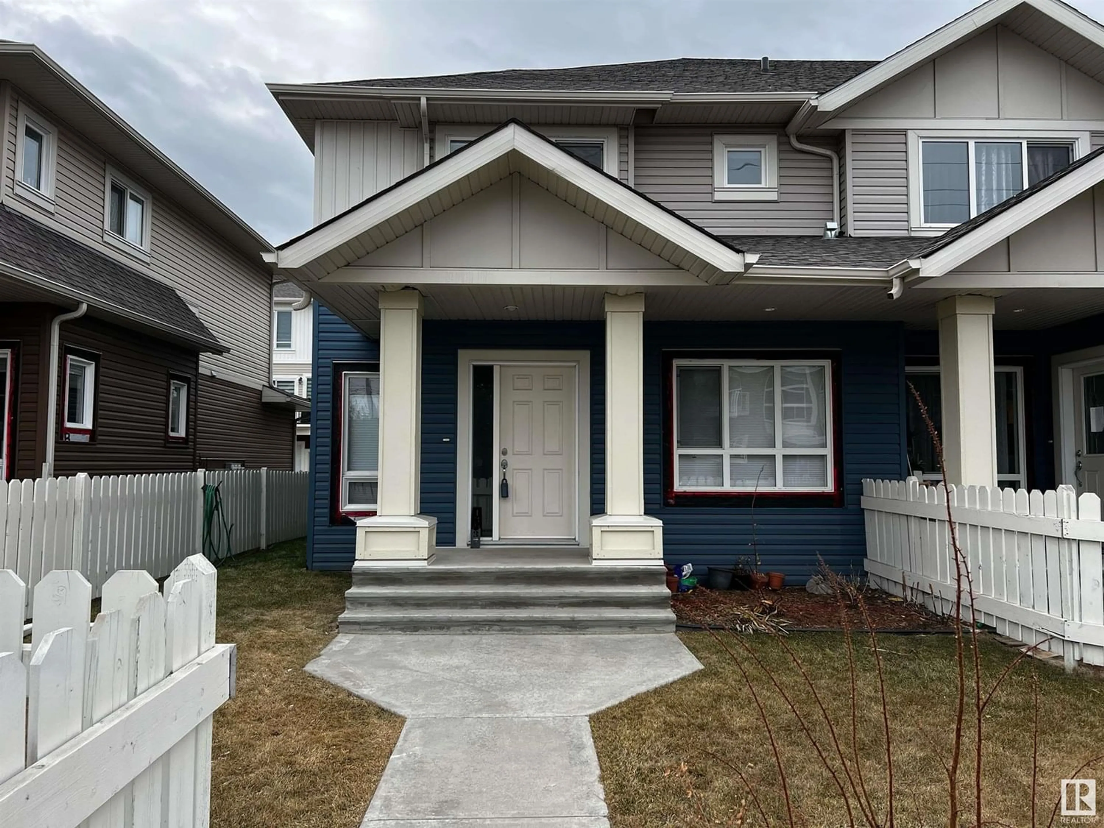 Frontside or backside of a home for 13037 132 AV NW, Edmonton Alberta T5L3R2