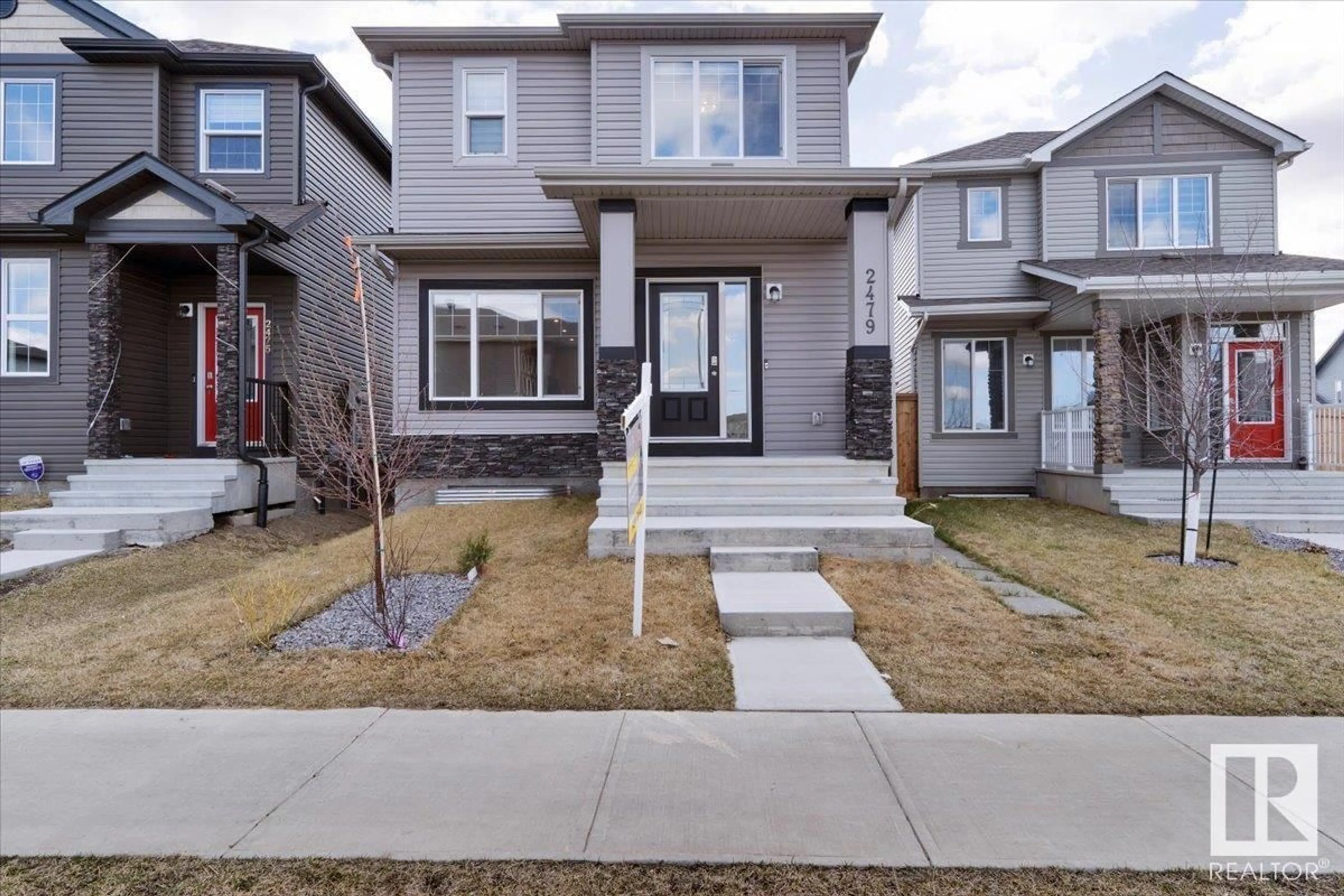 Frontside or backside of a home for 2479 14 AV NW, Edmonton Alberta T6T2J6
