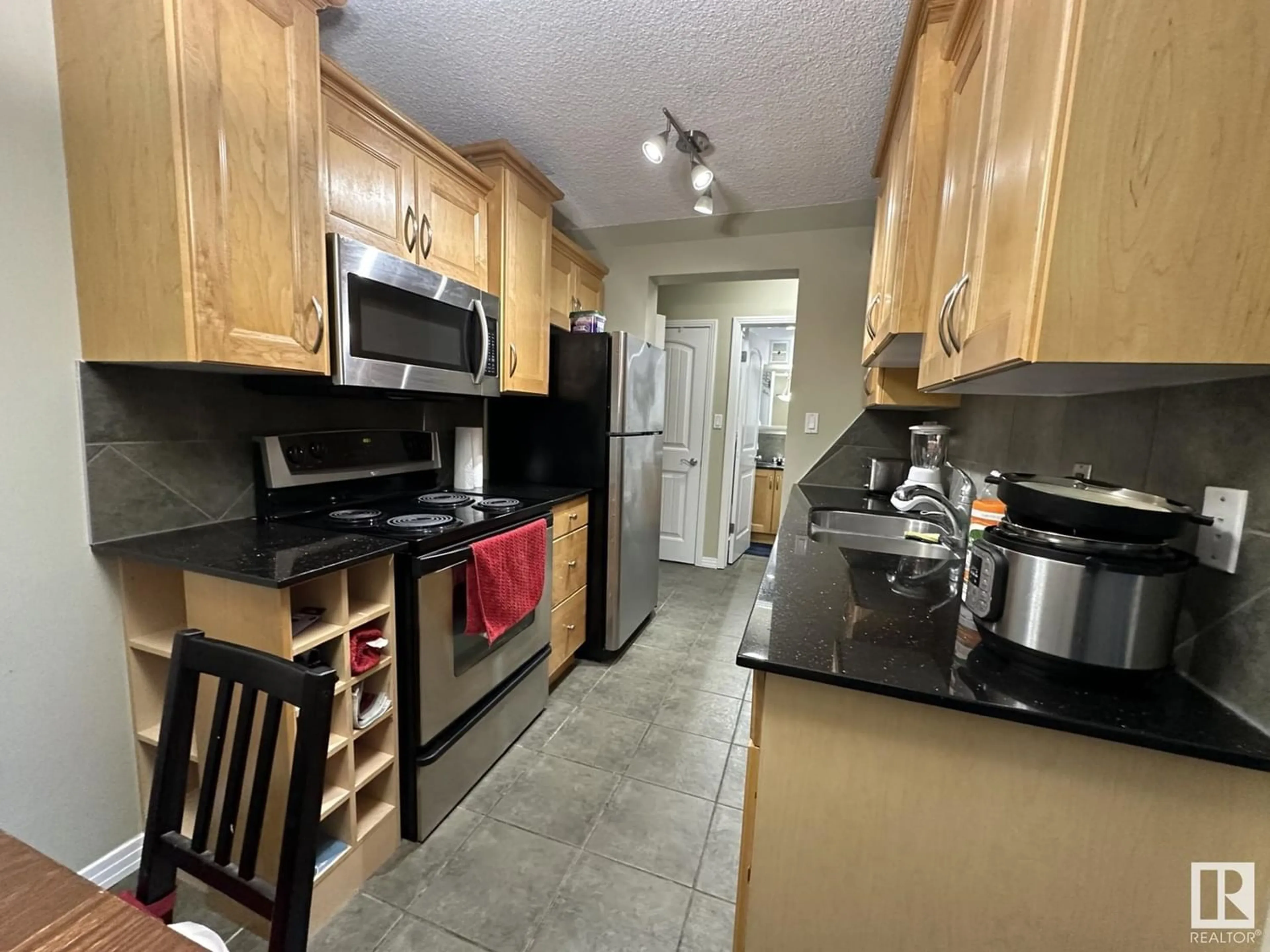 Standard kitchen for #103 8215 83 AV NW, Edmonton Alberta T6C1A7