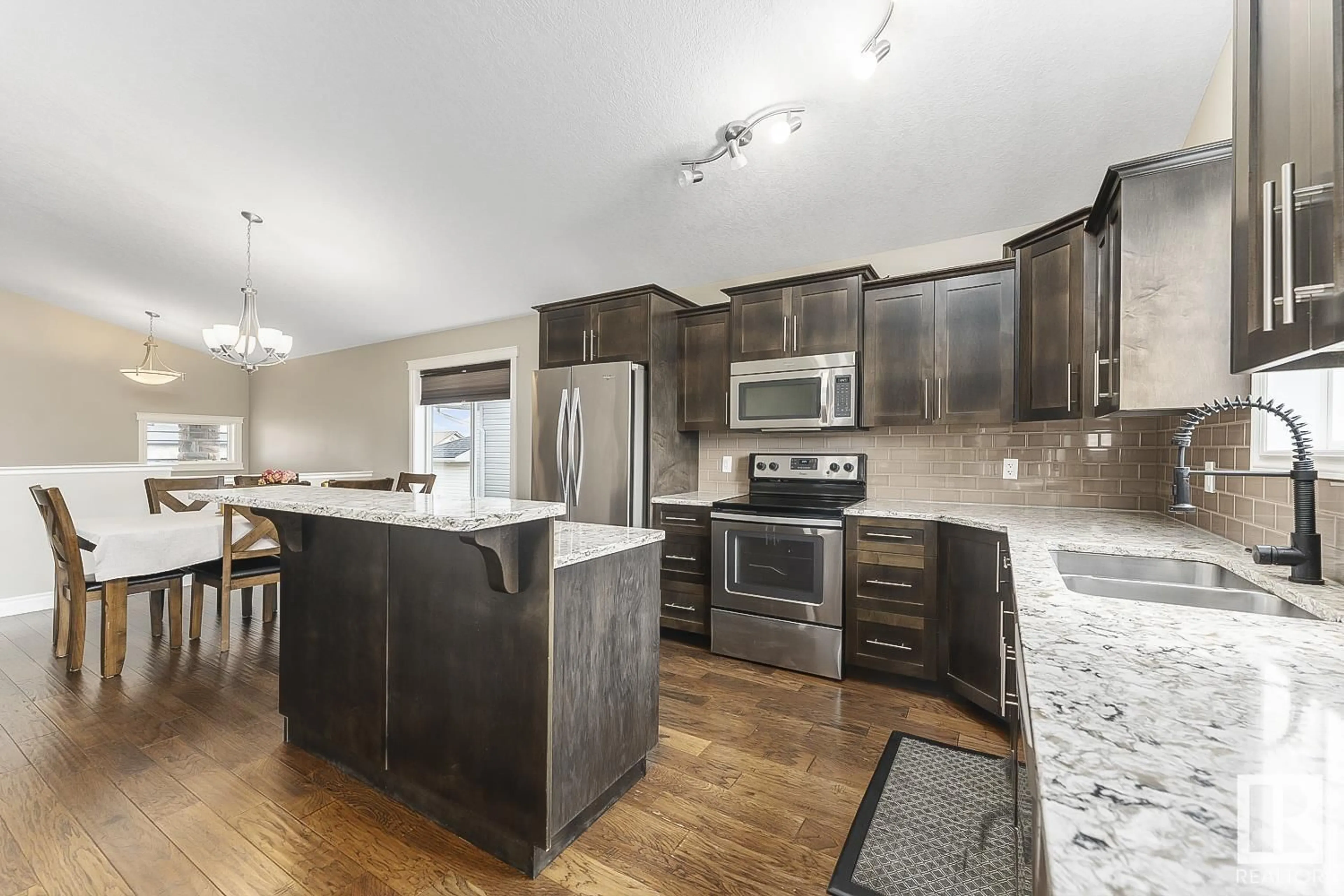 Open concept kitchen for 3606 Beau Vista BV, Bonnyville Town Alberta T9N0C8