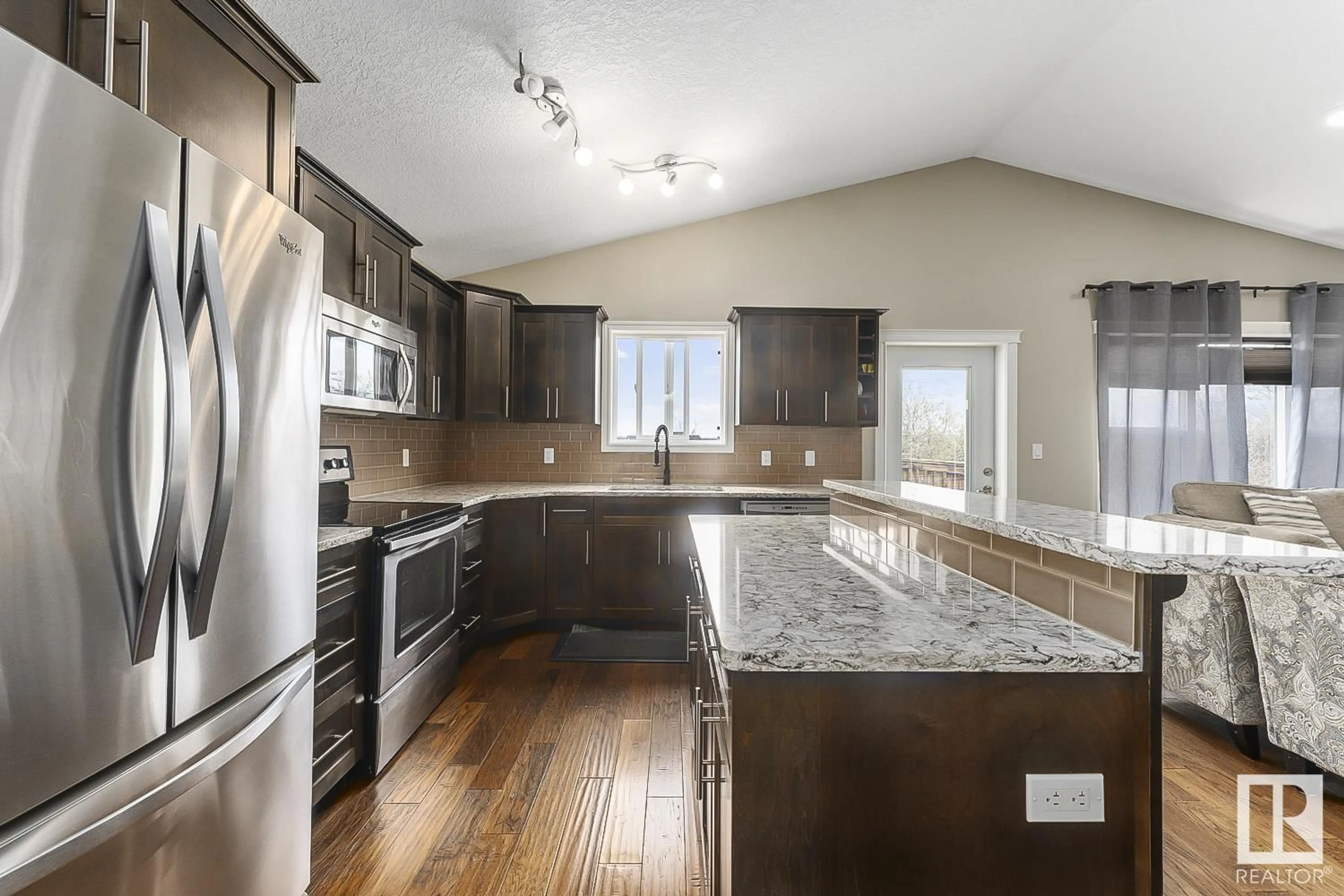 Open concept kitchen for 3606 Beau Vista BV, Bonnyville Town Alberta T9N0C8