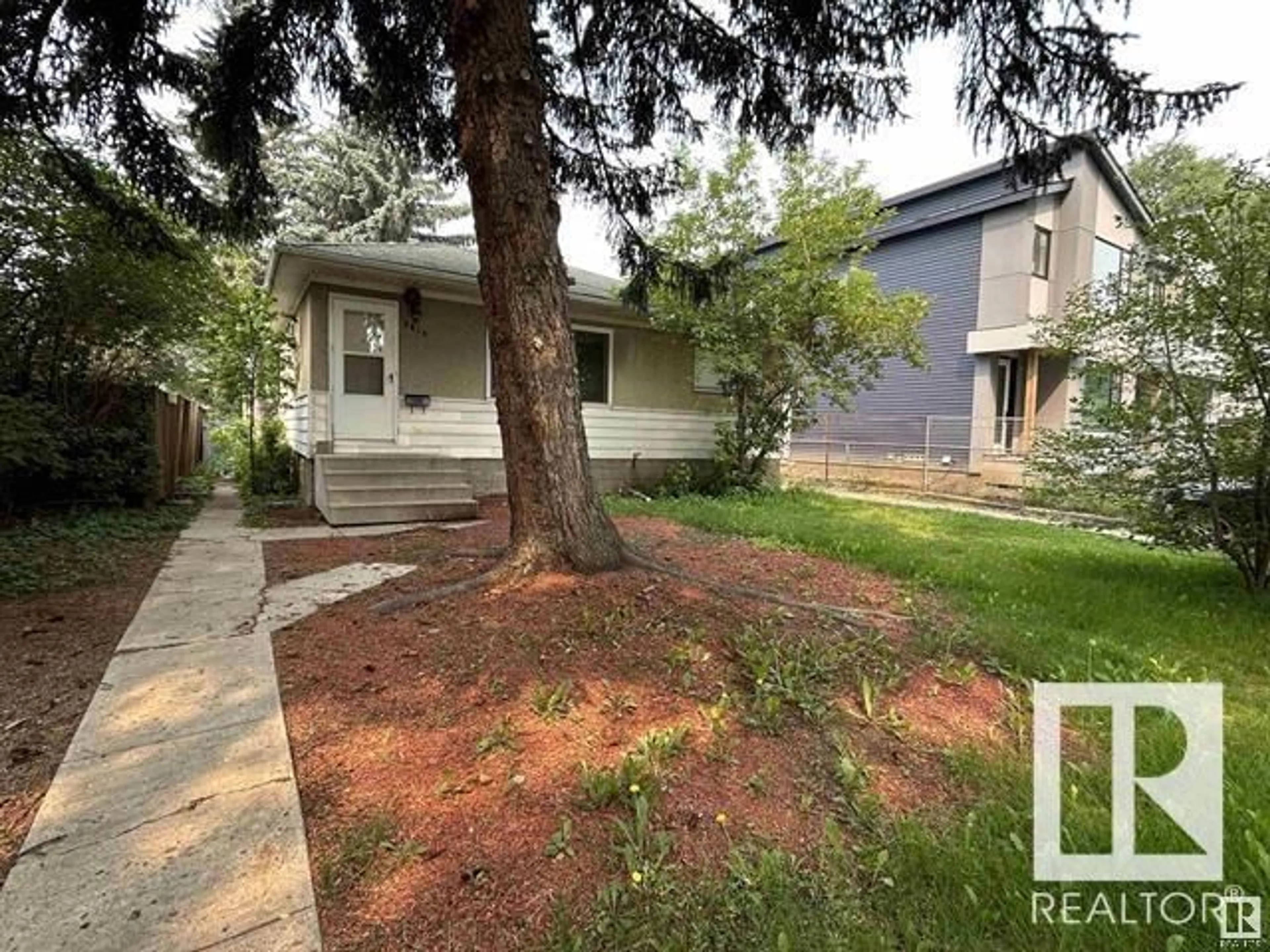 Frontside or backside of a home for 8816 79 ST NW, Edmonton Alberta T6C2P6