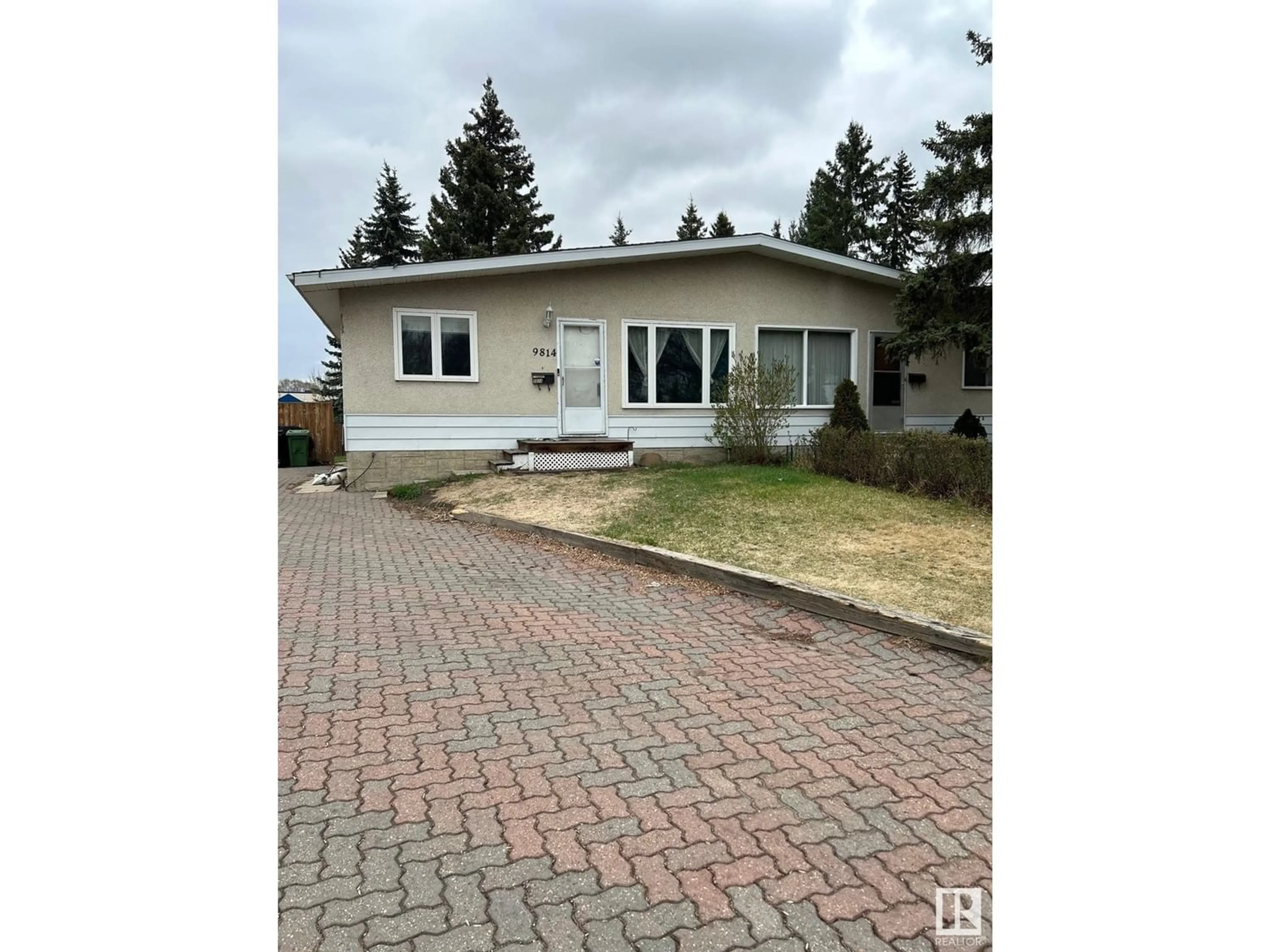 Frontside or backside of a home for 9814 91 ST, Fort Saskatchewan Alberta T8L1L3