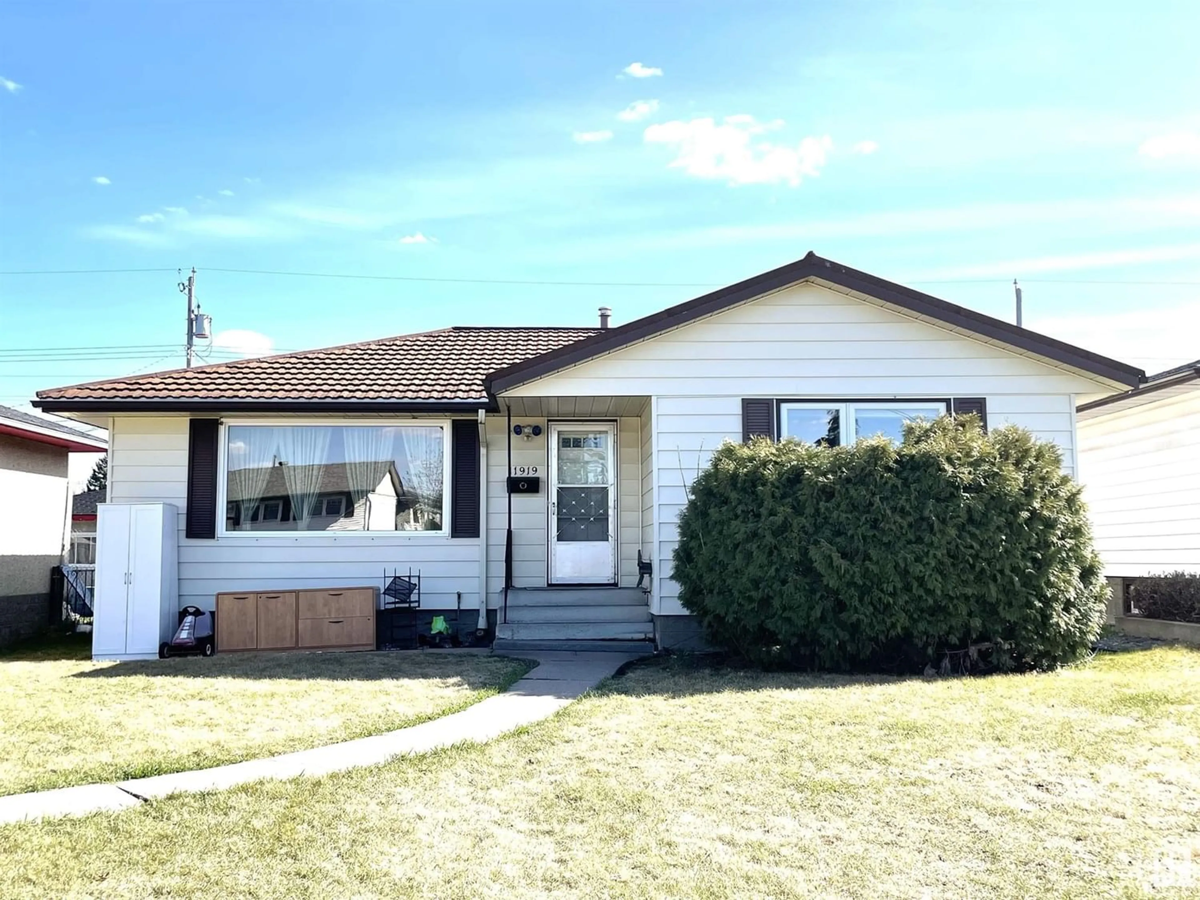 Frontside or backside of a home for 11919 133 AV NW, Edmonton Alberta T5E1E8