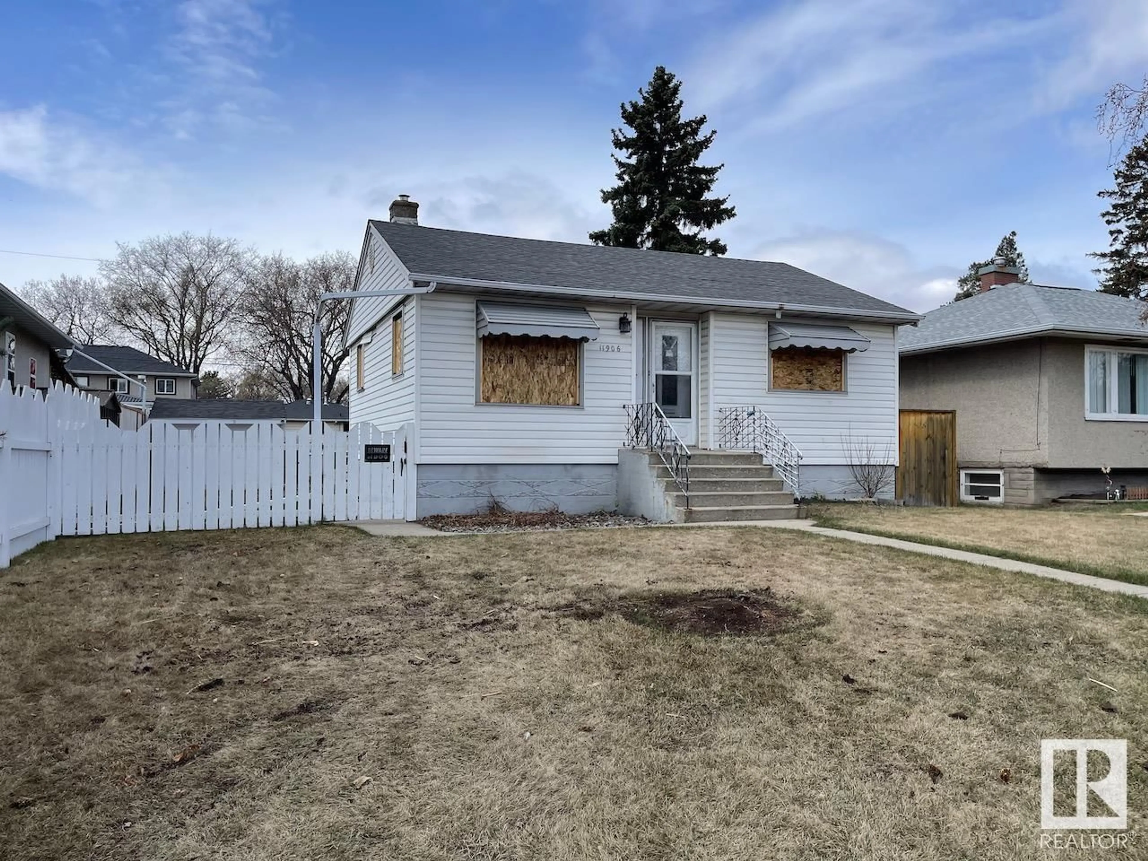 Frontside or backside of a home for 11906 50 ST NW, Edmonton Alberta T5W3C2