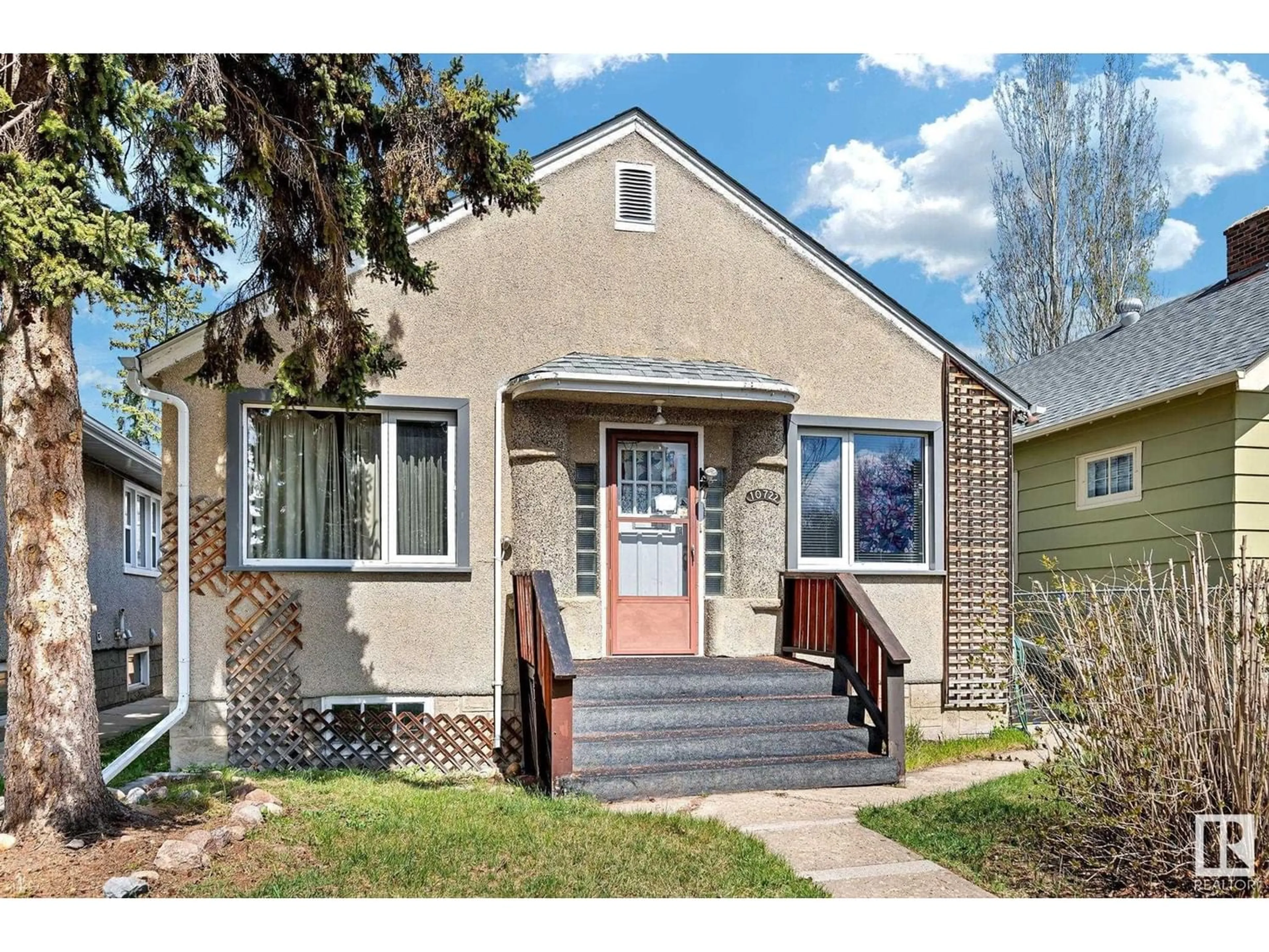 Frontside or backside of a home for 10722 74 AV NW, Edmonton Alberta T6E1G6