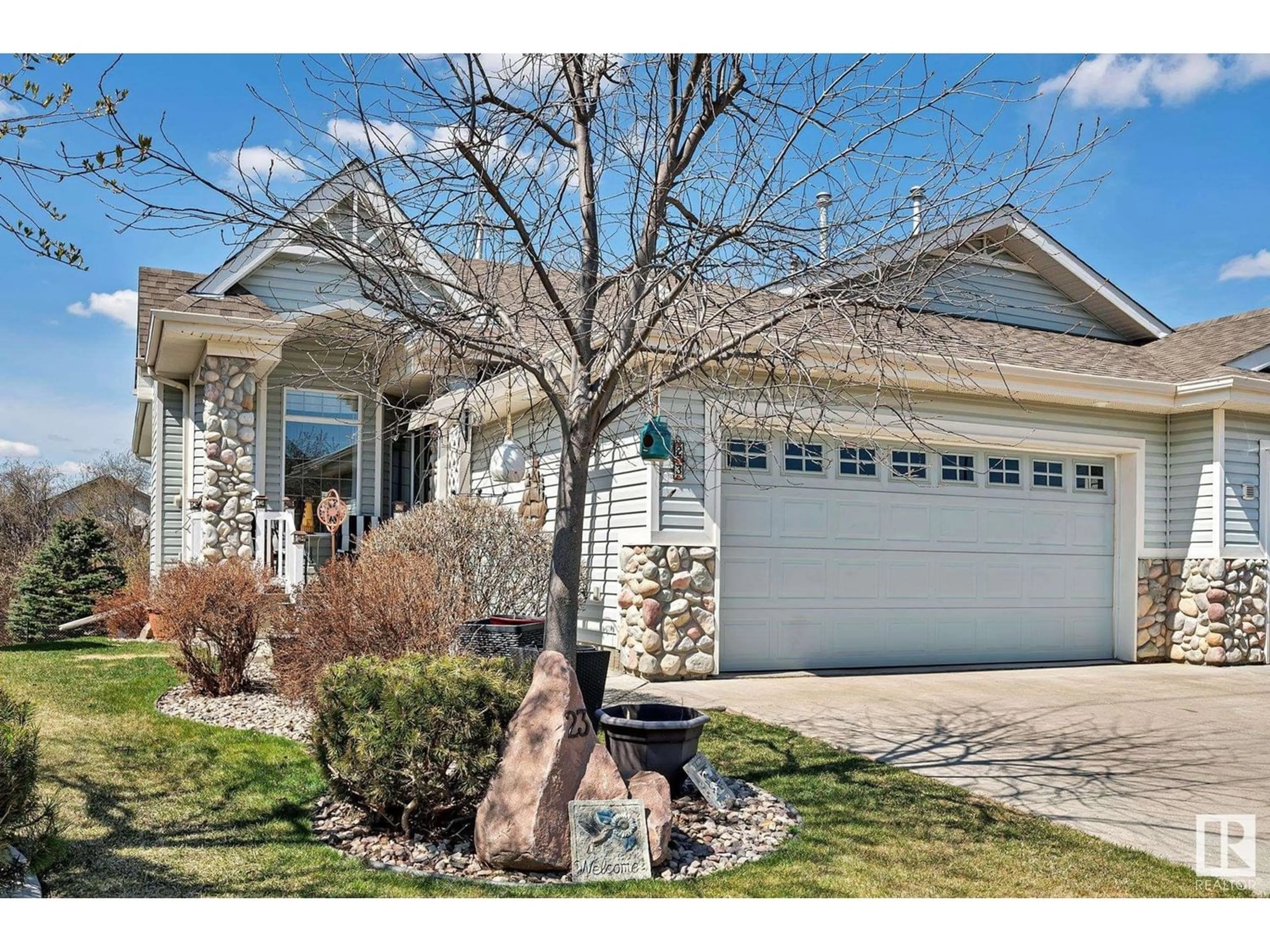 Frontside or backside of a home for 23 BRIARWOOD VG, Stony Plain Alberta T7Z2Y7