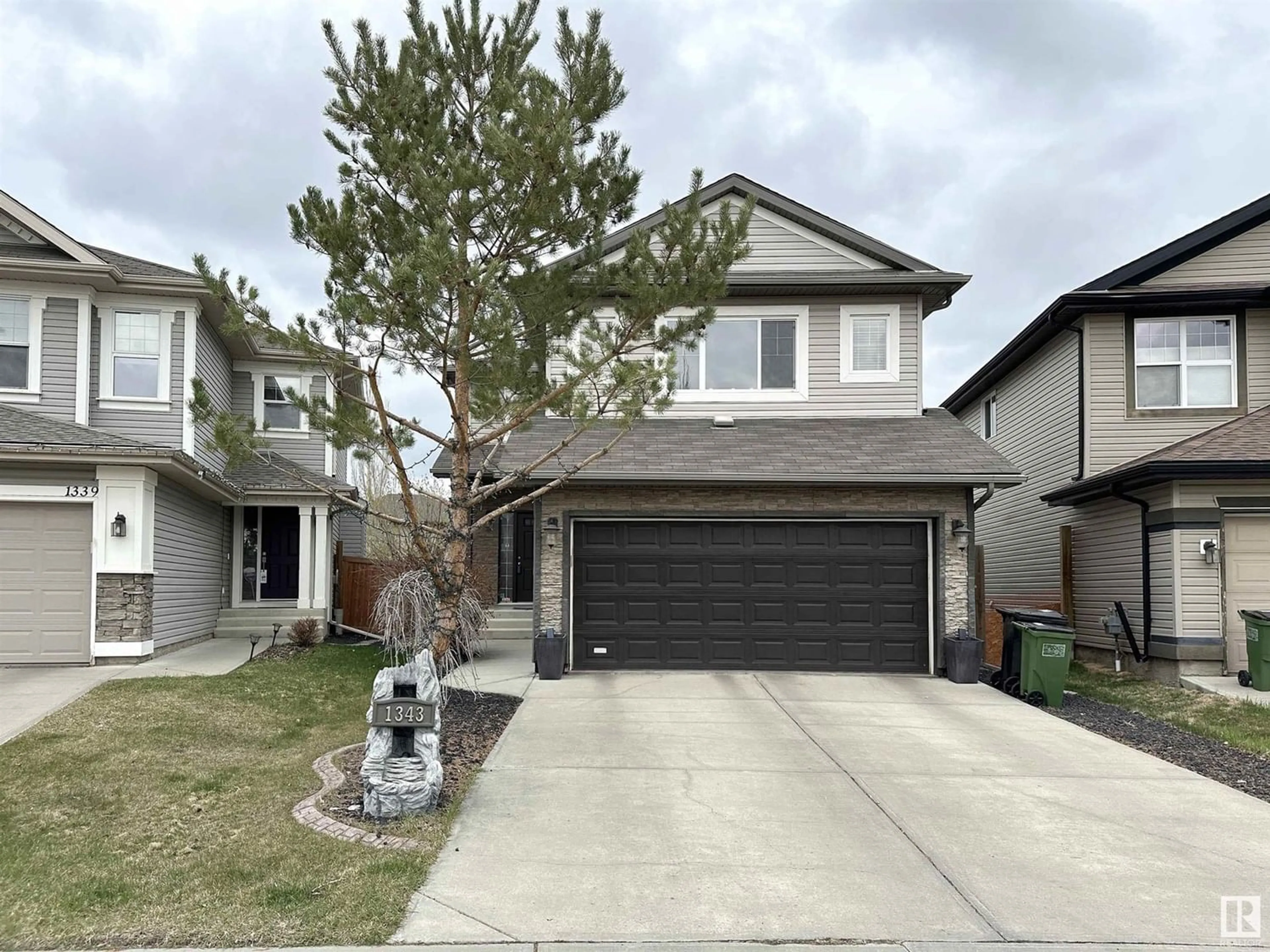 Frontside or backside of a home for 1343 117 ST SW, Edmonton Alberta T6W0E6