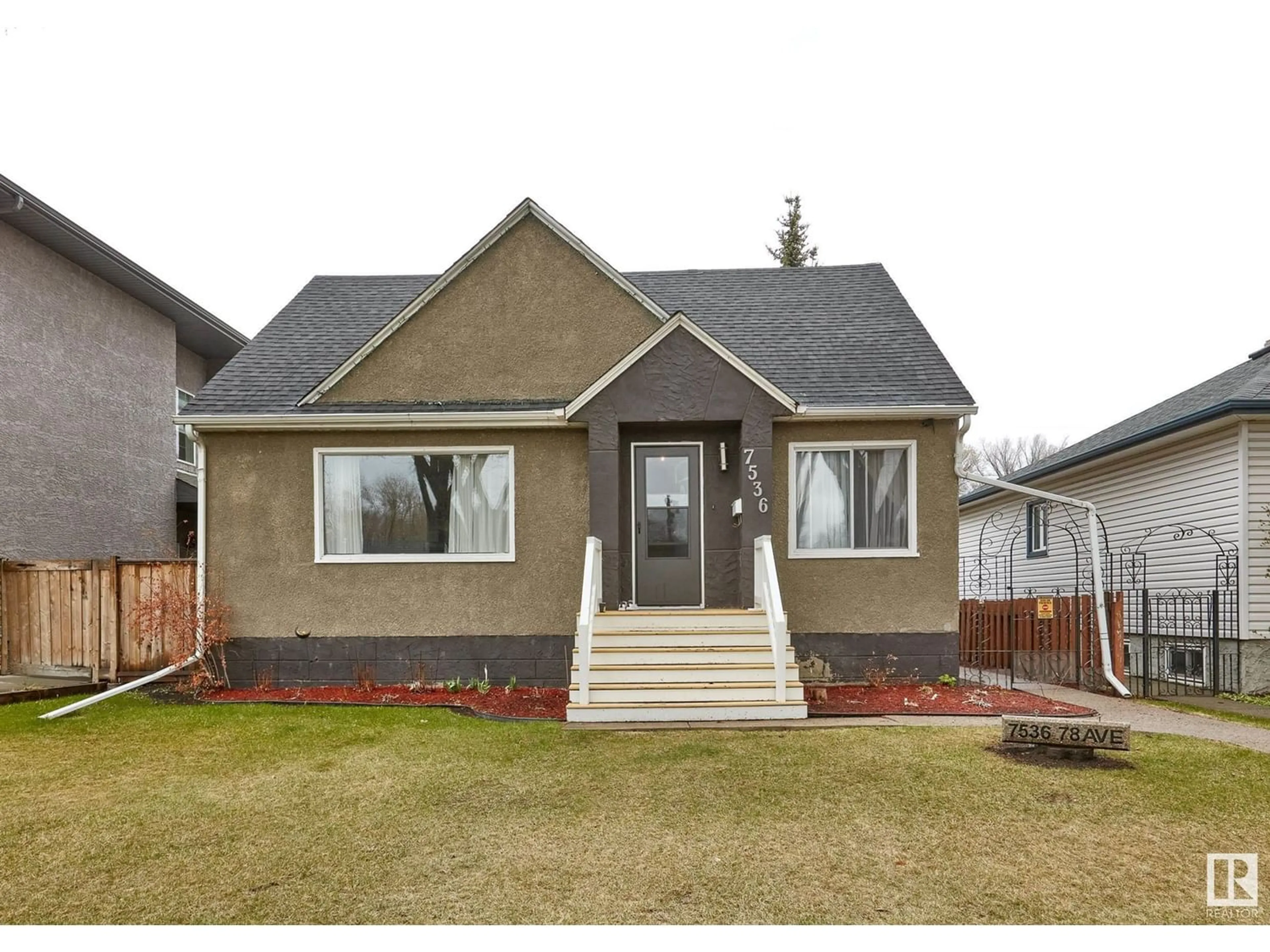 Frontside or backside of a home for 7536 78 AV NW, Edmonton Alberta T6C0M7