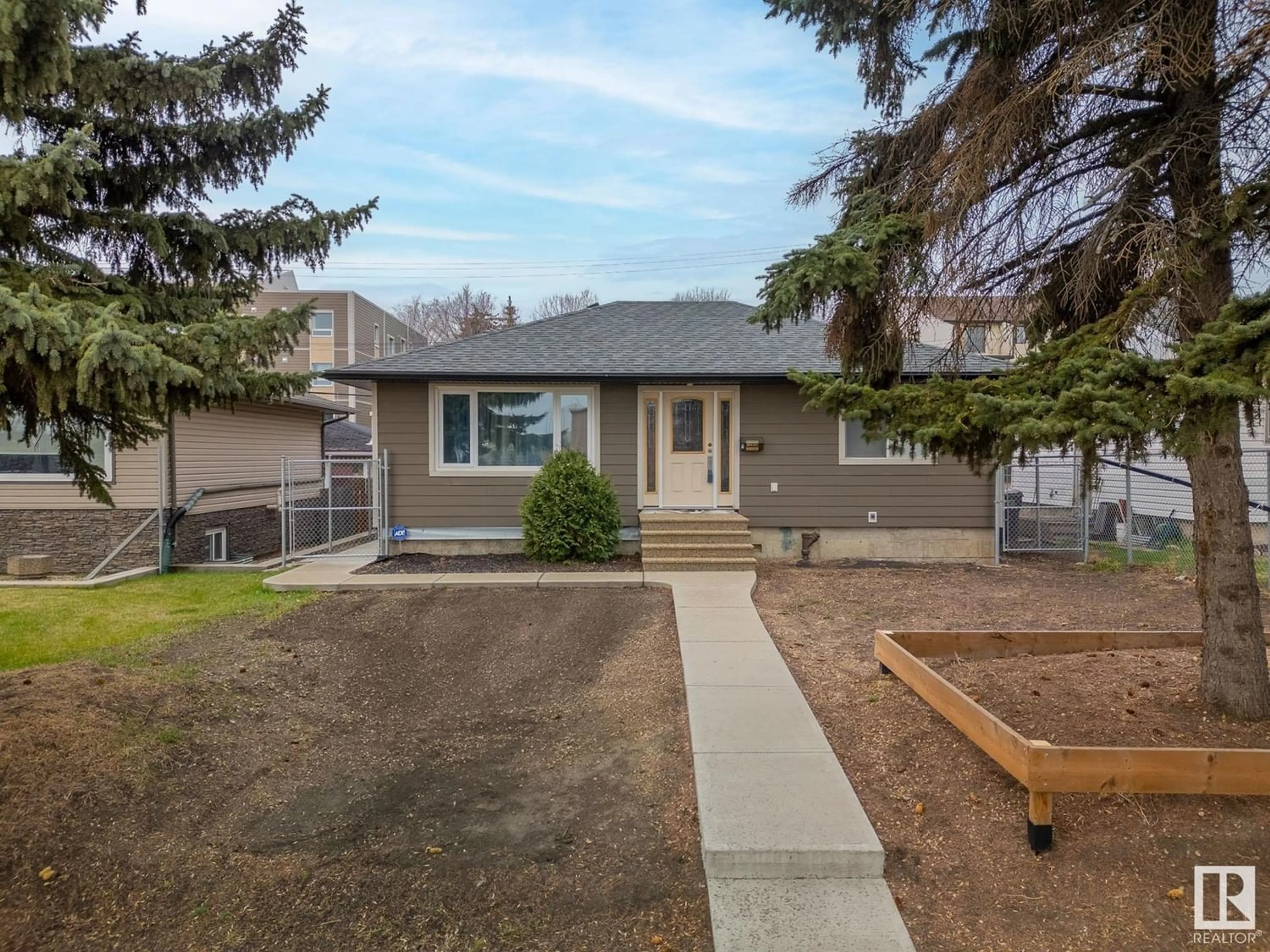 Frontside or backside of a home for 12920 63 ST NW, Edmonton Alberta T5A0W3
