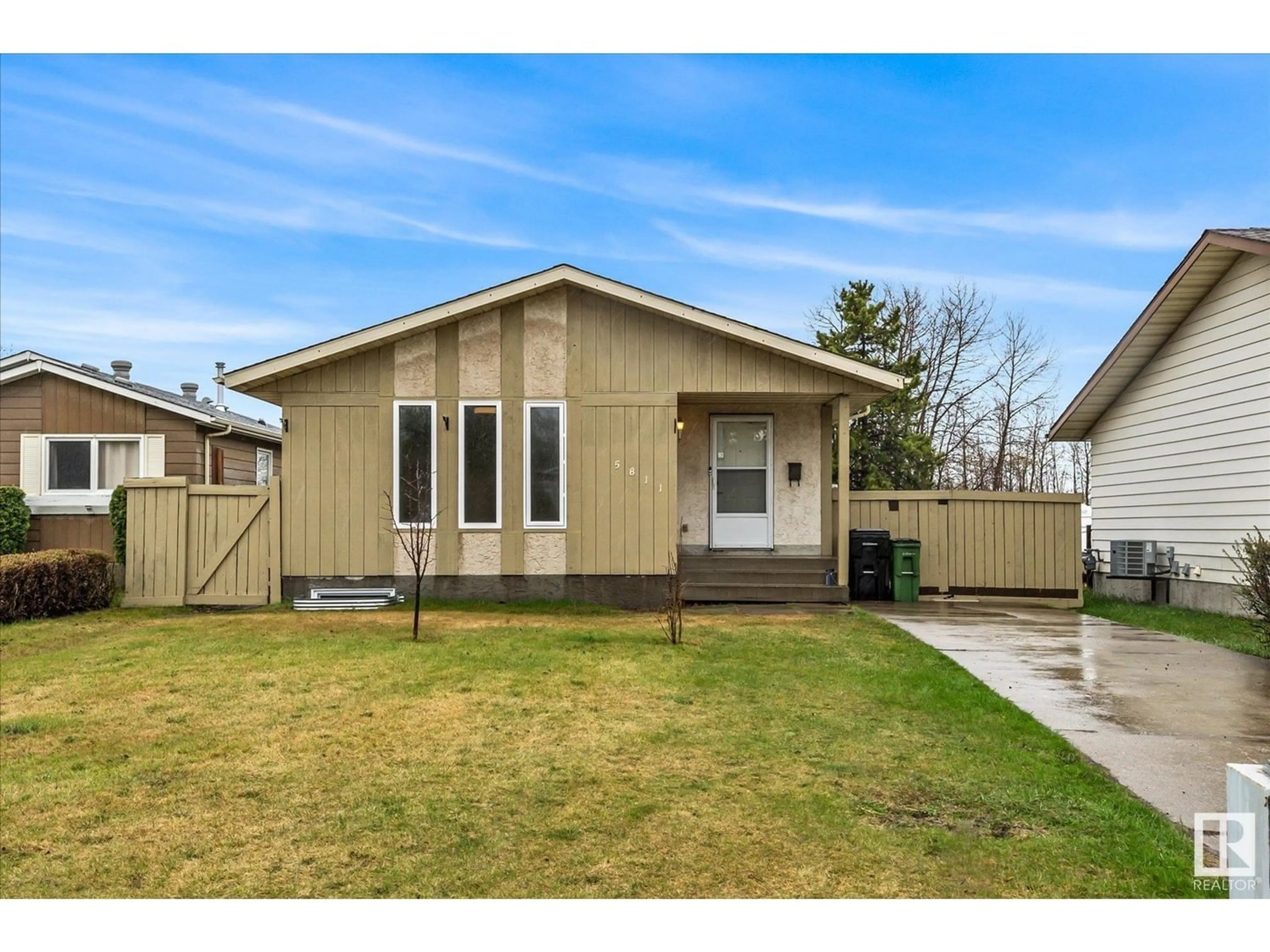 Frontside or backside of a home for 5811 10 Avenue NW, Edmonton Alberta T6L3A5