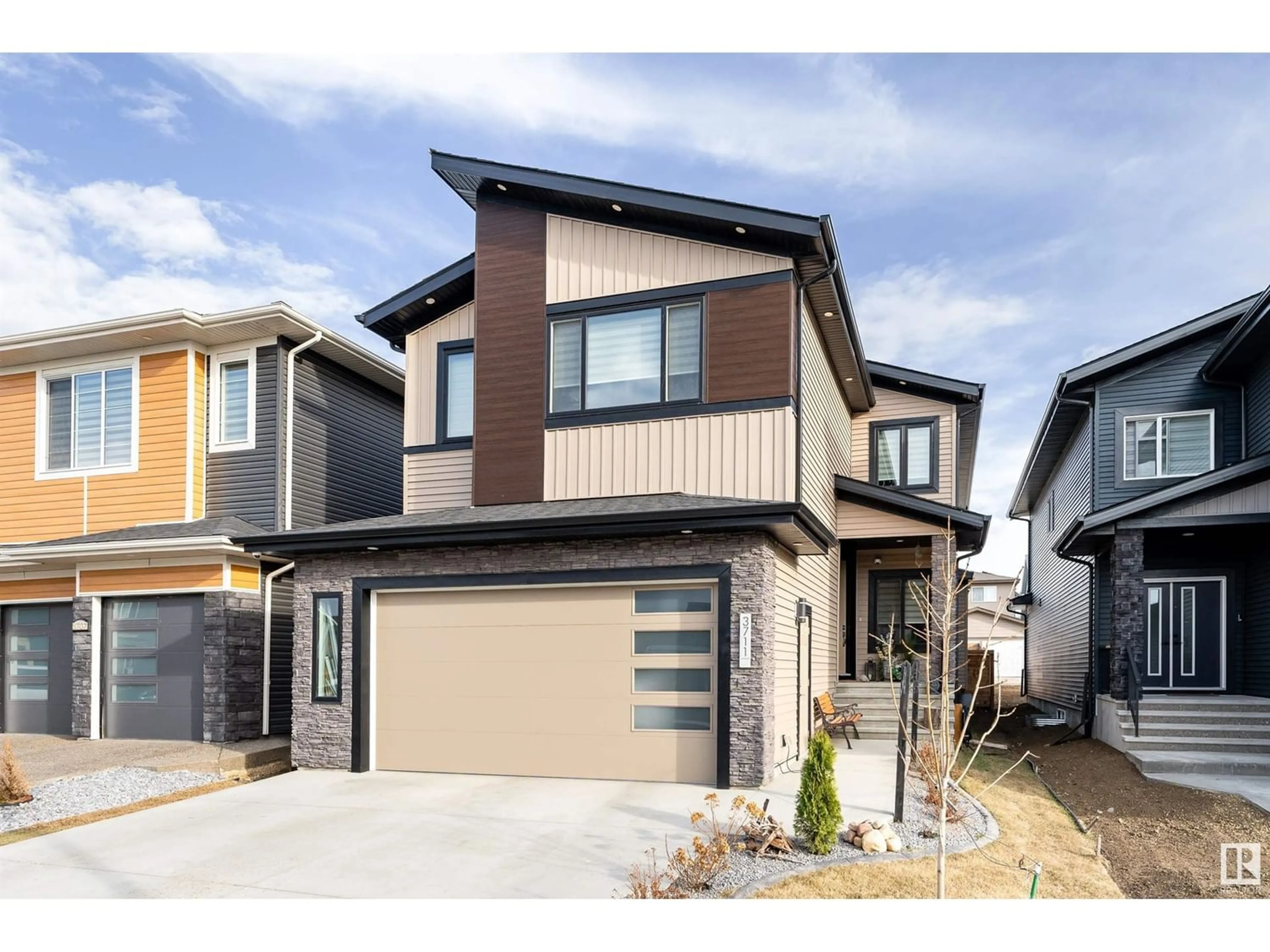 Frontside or backside of a home for 3711 3 AV SW, Edmonton Alberta T6X2W3