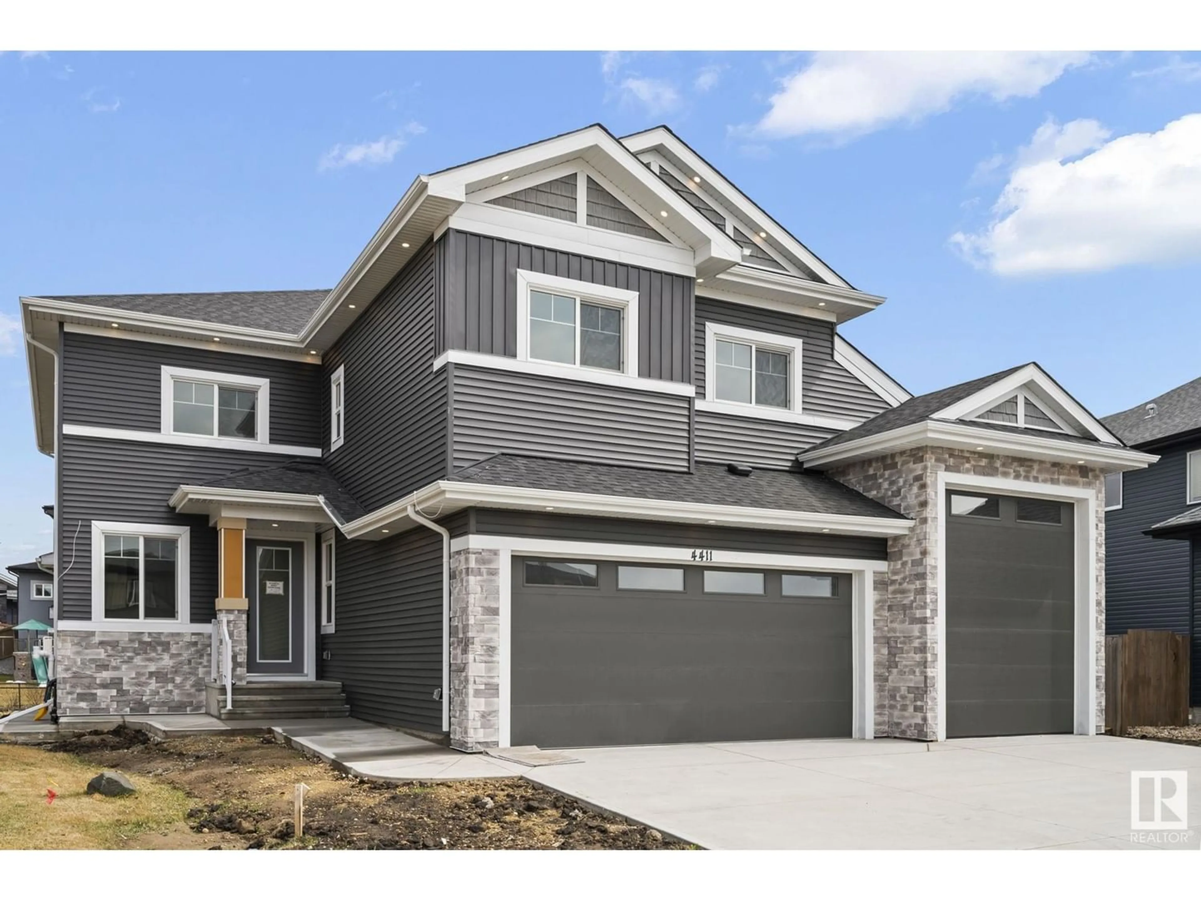 Frontside or backside of a home for 4411 TRIOMPHE CL, Beaumont Alberta T4X0C3