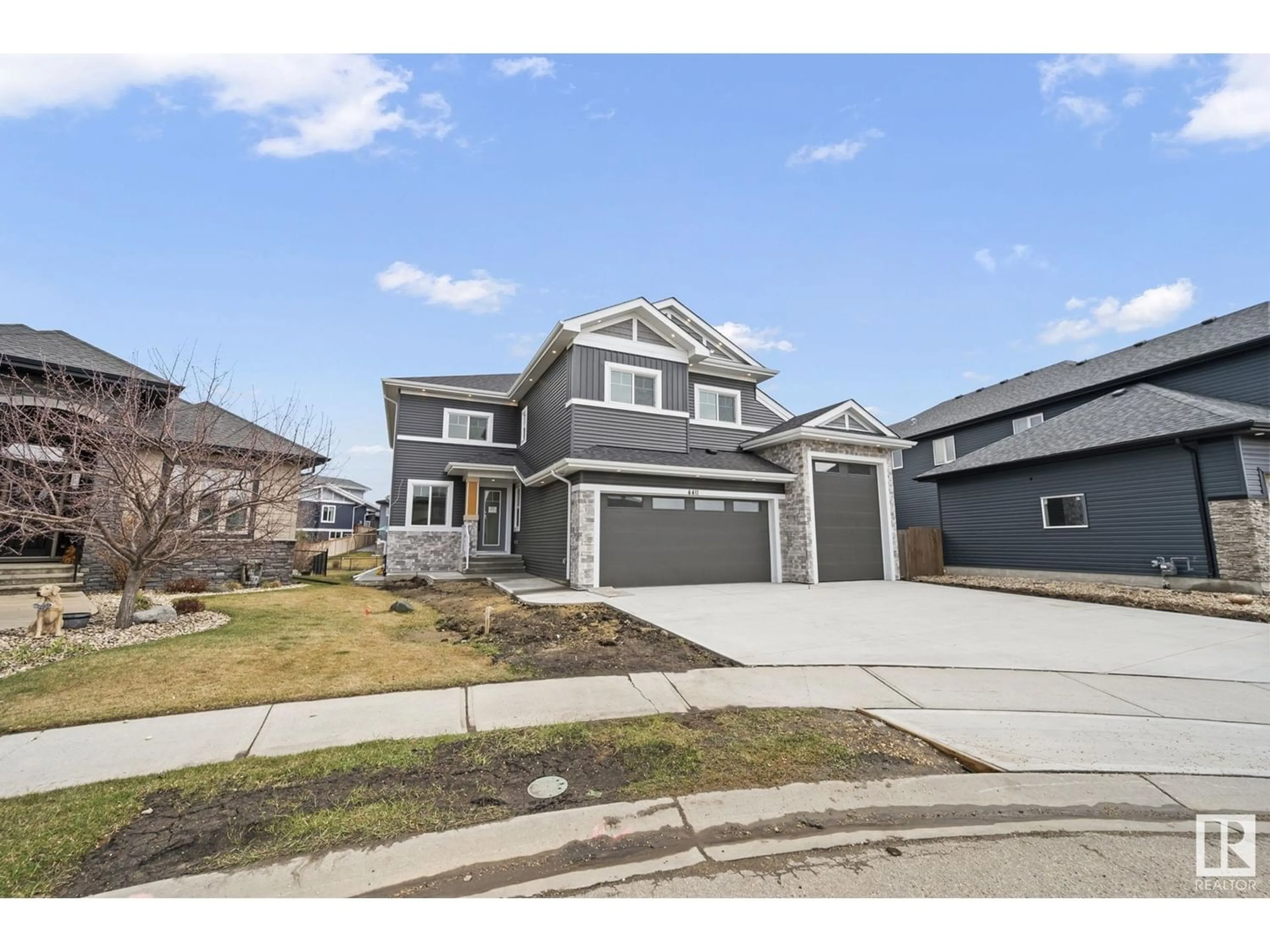 Frontside or backside of a home for 4411 TRIOMPHE CL, Beaumont Alberta T4X0C3