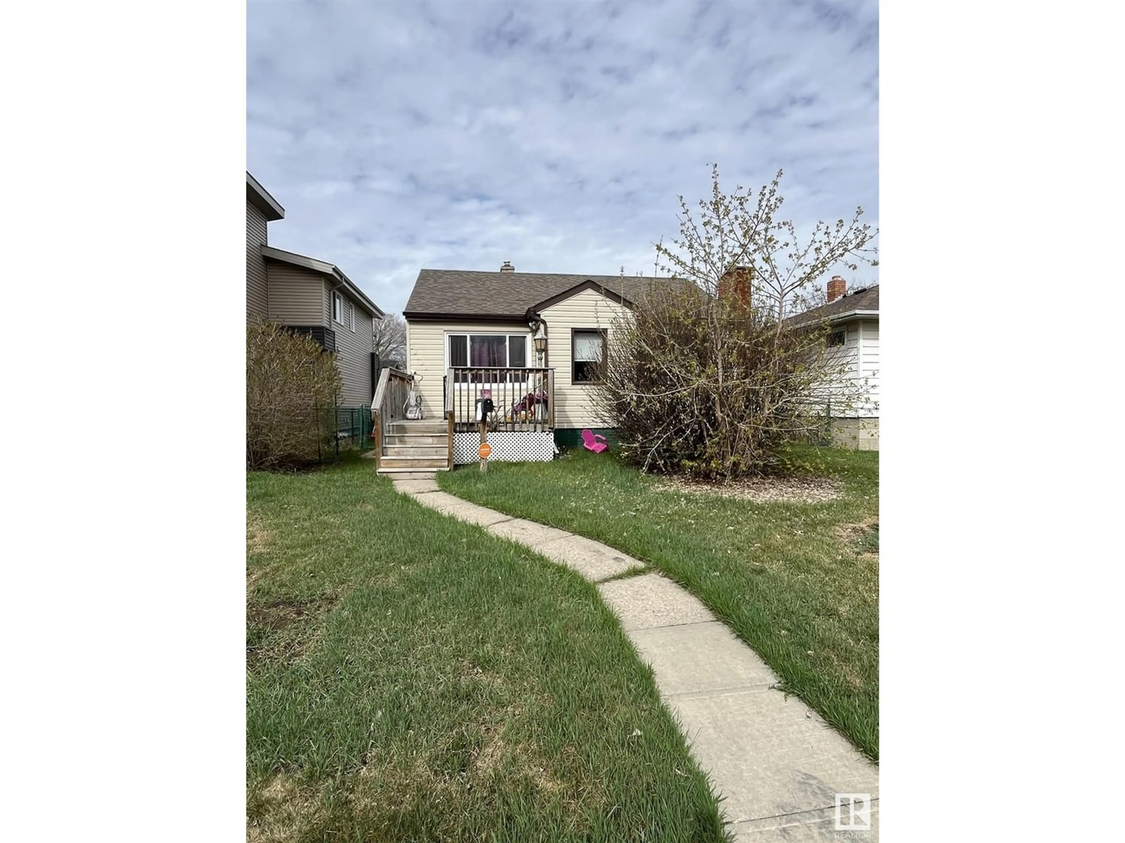 Frontside or backside of a home for 12322 95 ST NW, Edmonton Alberta T5G1N3