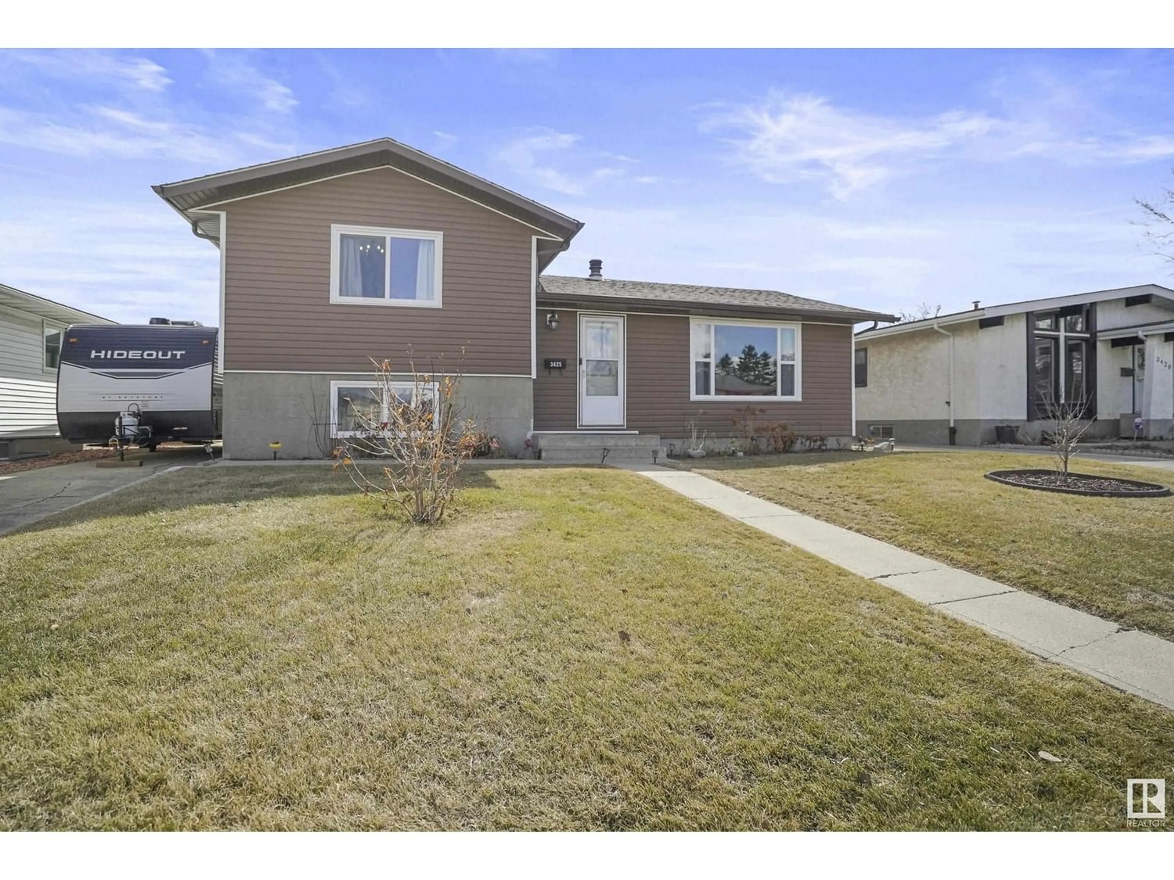 Frontside or backside of a home for 3425 136A AV NW, Edmonton Alberta T5A2W5