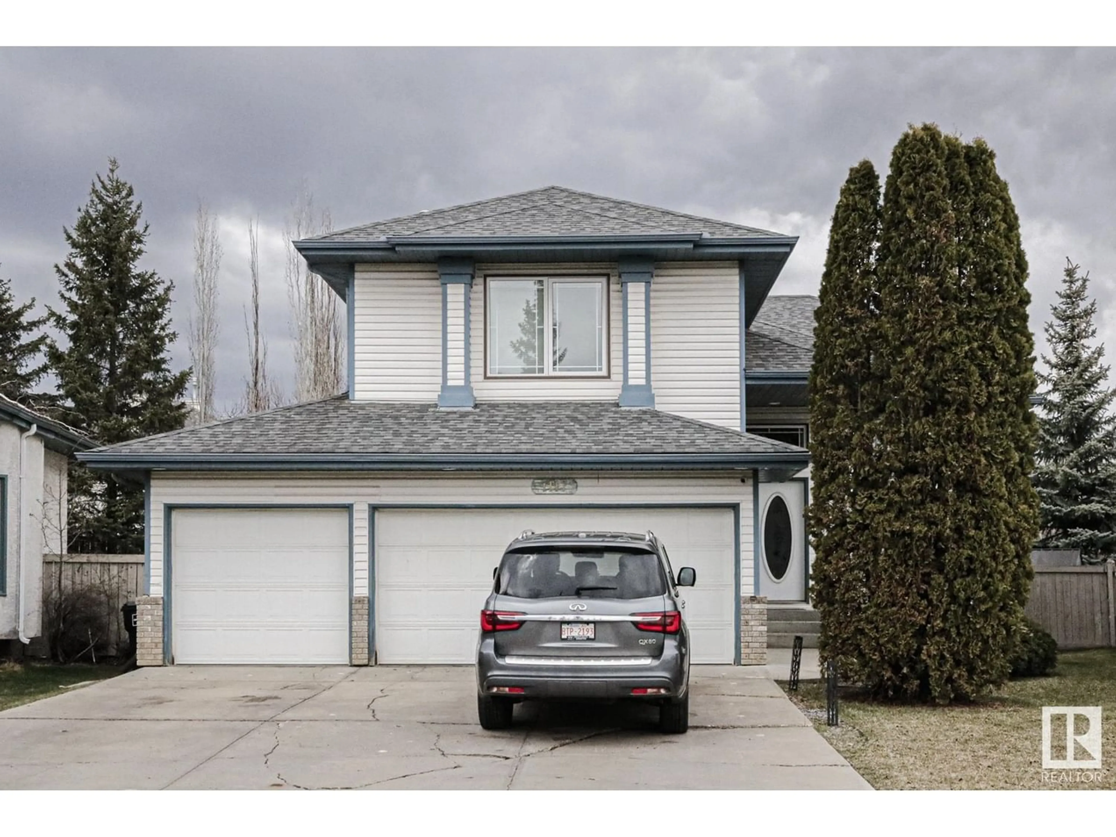 Frontside or backside of a home for 1117 116 ST NW, Edmonton Alberta T6J6X5