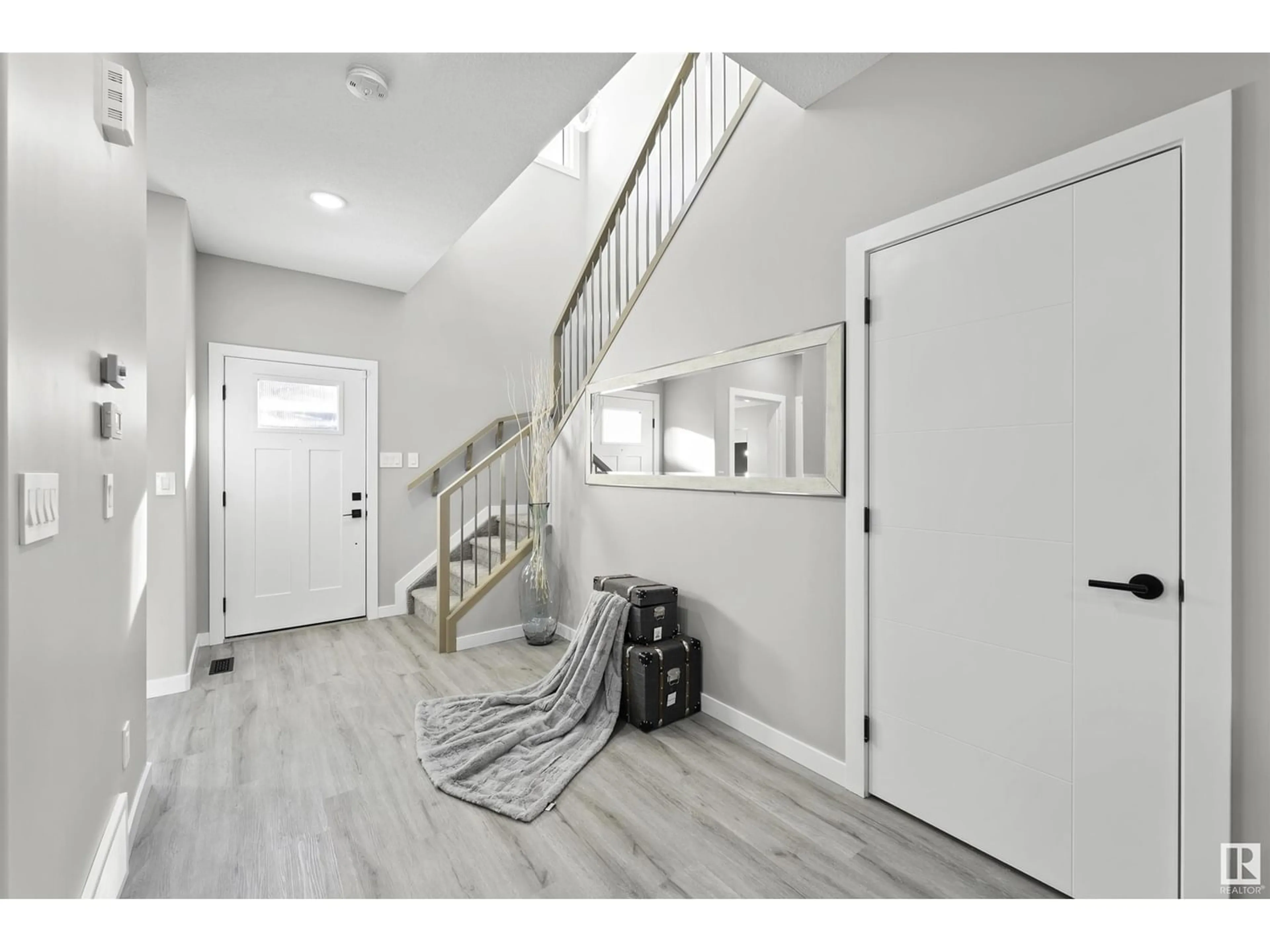 Indoor entryway, wood floors for #61 130 Hawks Ridge BV NW, Edmonton Alberta T5S0T2