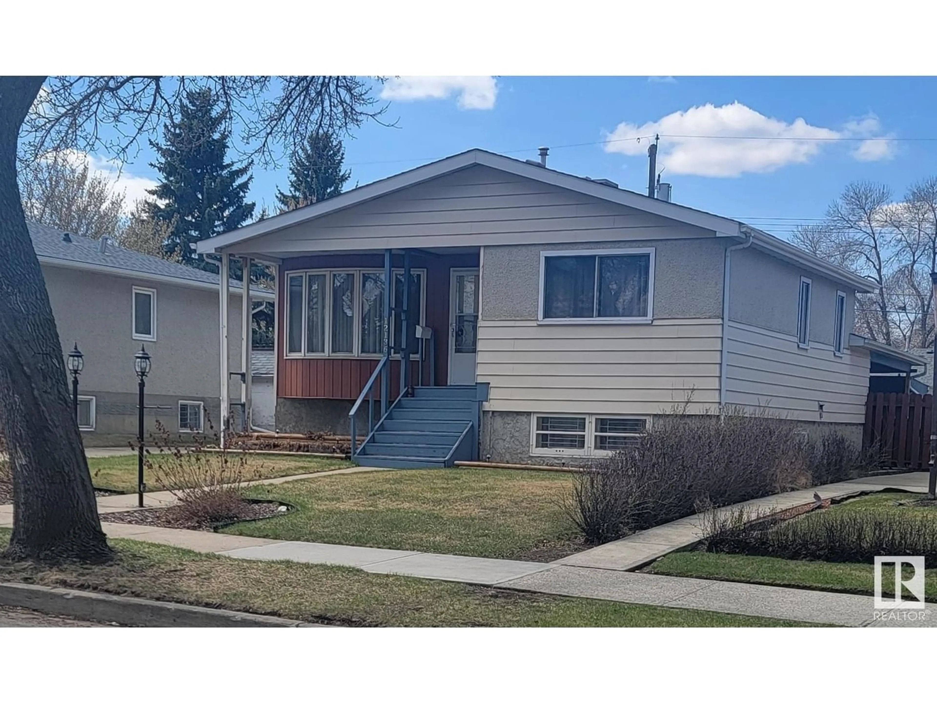 Home with vinyl exterior material for 12136 38 ST NW NW, Edmonton Alberta T5W2J1