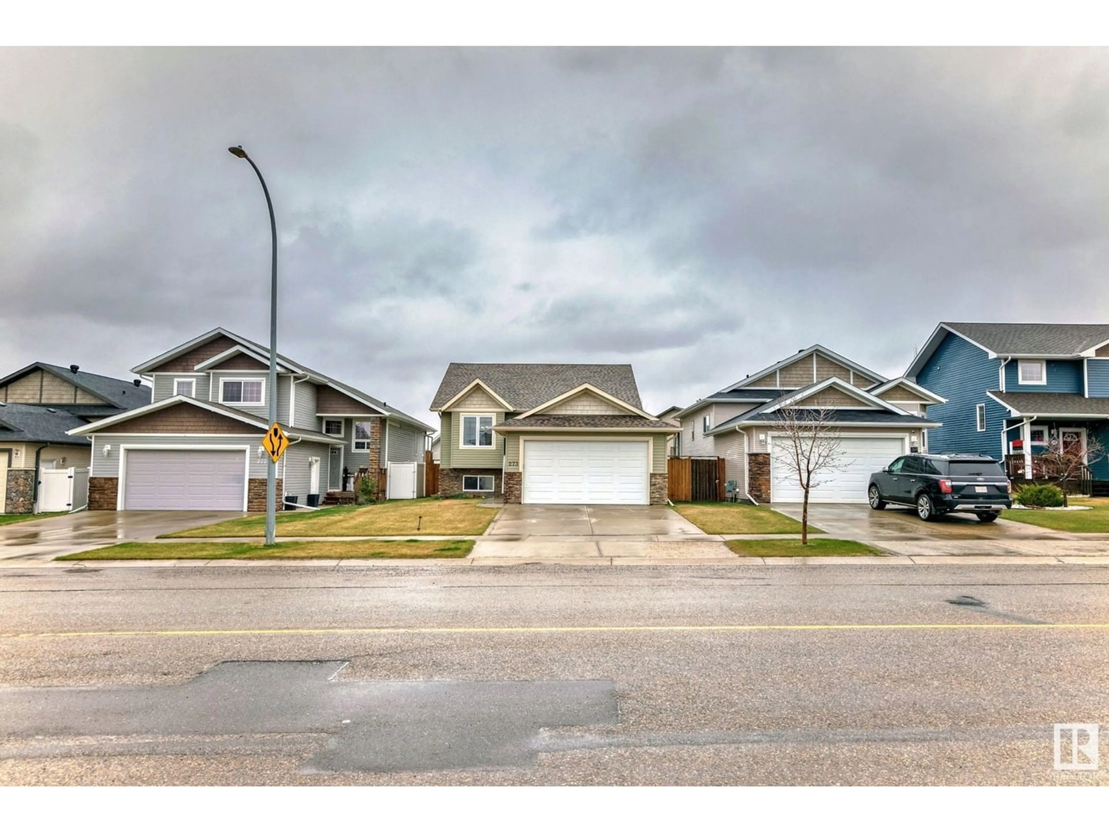 A pic from exterior of the house or condo for 273 Carrington DR, Red Deer Alberta T4P0M3